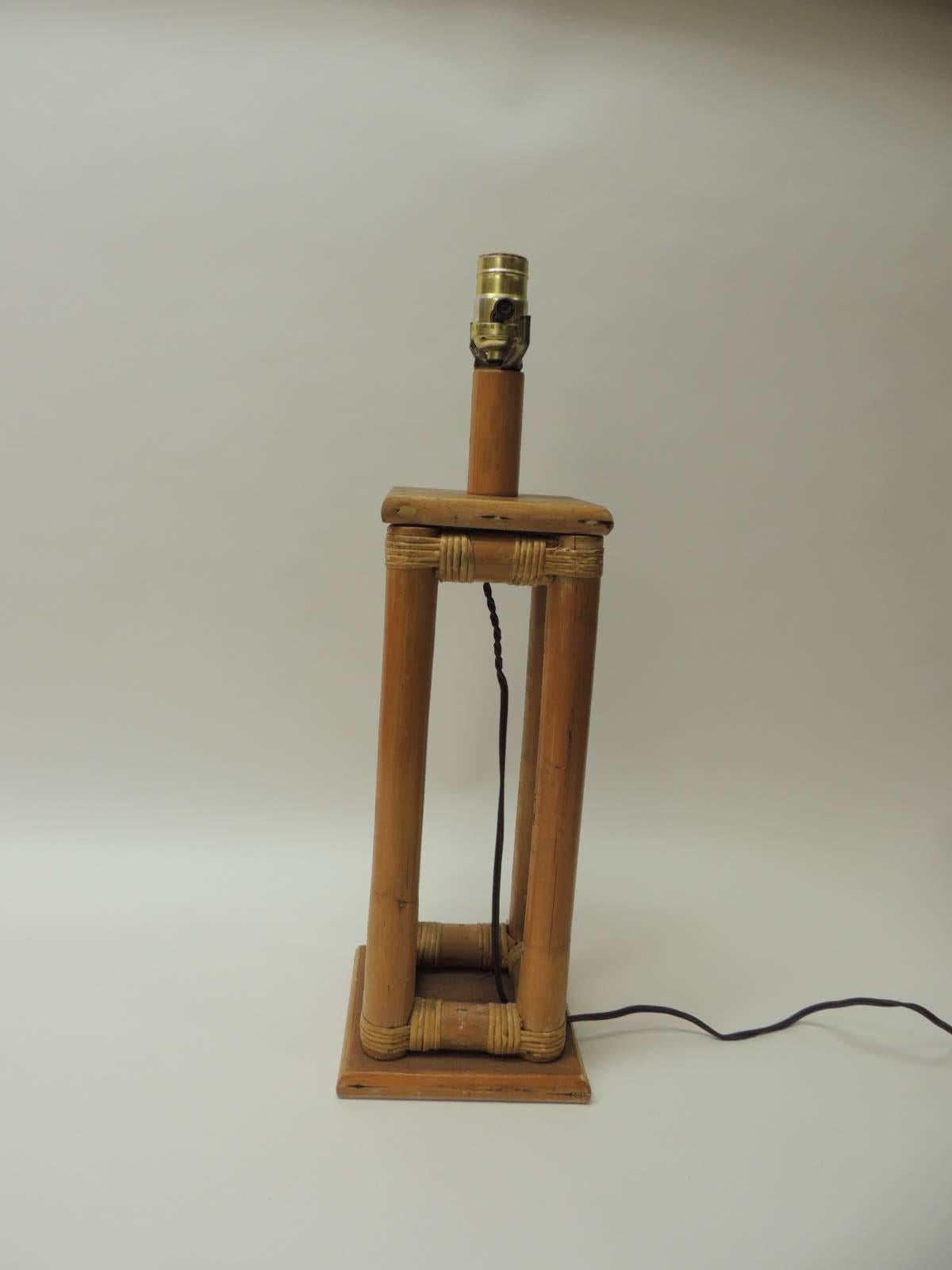 This item is part of our 7th Anniversary SALE:
Vintage square bamboo and rattan square table lamp.
Square base and top.
Works great.  NO LAMP SHADE!
Size: 6.5 x 6.5 x 21 H.