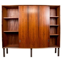 Closed Danish bookcase in Rosewood by Arne Vodder for Sibast Furnitures 1960.
