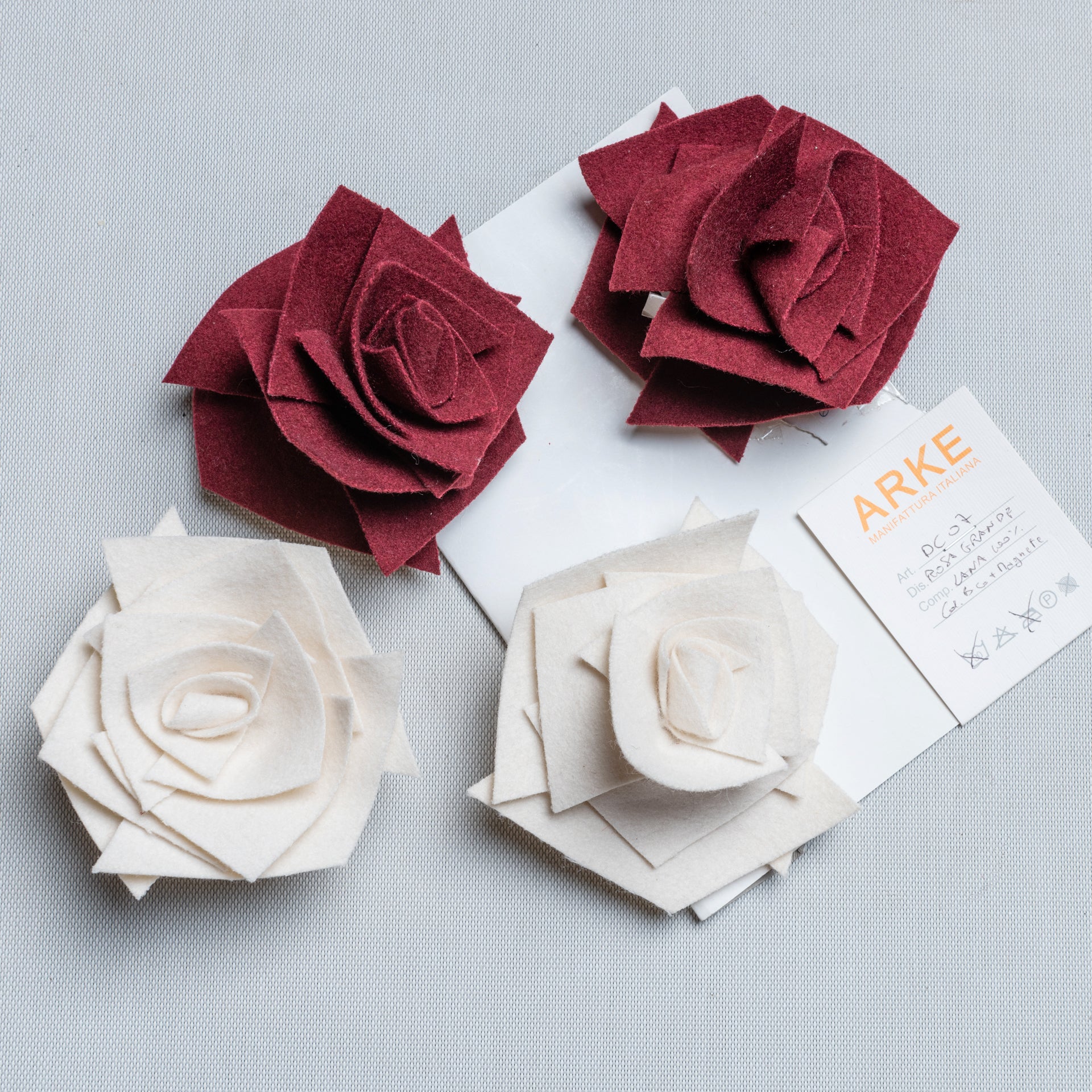 Cloth roses, all hand made by an Italian Studio: as a curtain trim.
When You want to raise the curtain on one side, You can stop it with one of these roses that has a magnet.
Look to the other ones.

ref. B/1866