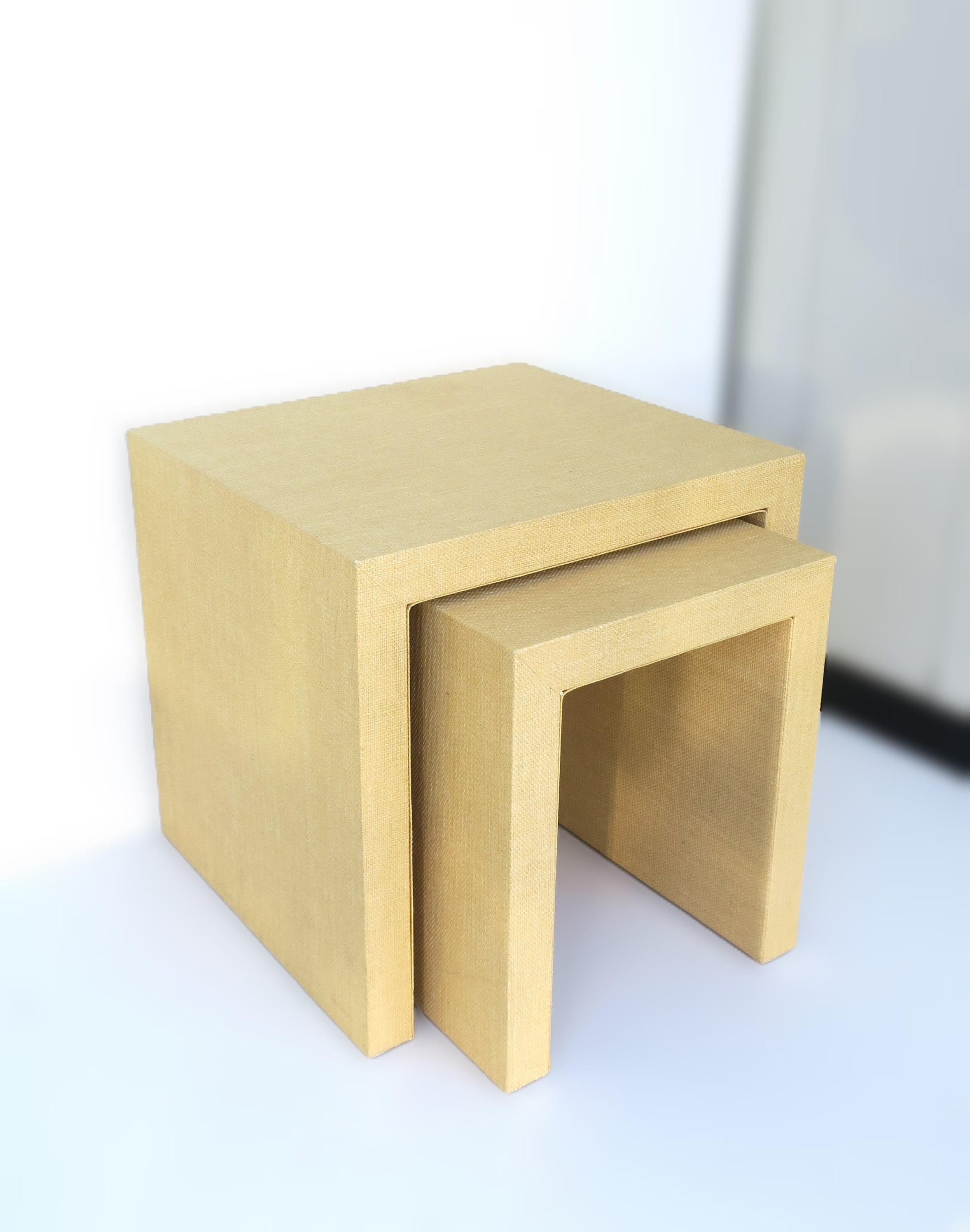 A neutral set of cloth-wrapped nesting tables. A convenient set as end tables or side/drink table combo. Hold a lamp, books, cocktails, a plant, etc. Many uses. Convenient size, dimensions below for both tables. 

Dimensions: 
Top table: 15