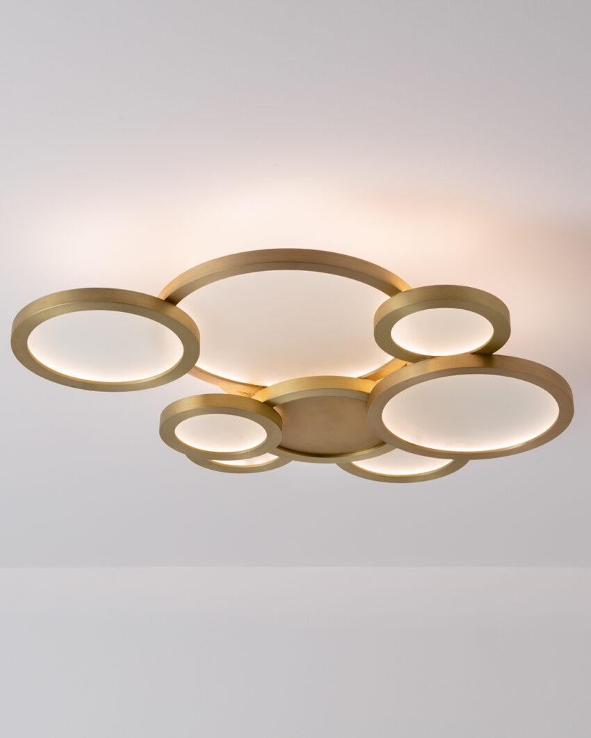 Cloud Brushed Brass Ceiling Mounted Lamp by Carla Baz
Dimensions: D 75 x W 58 x H 16 cm.
Materials: Brushed brass.
Weight: 16 kg.

Available in different finishes and materials: brushed brass, brushed bronze and brushed copper. Please contact us.