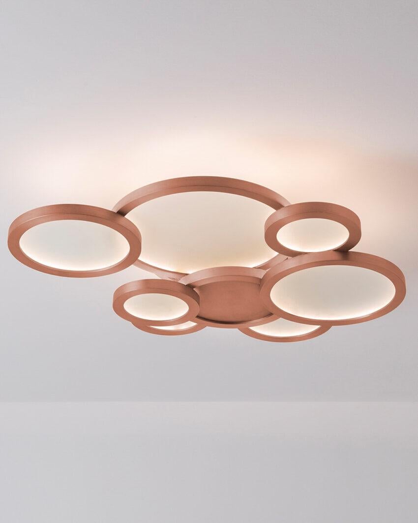 Cloud Brushed Copper Ceiling Mounted Lamp by Carla Baz
Dimensions: D 75 x W 58 x H 16 cm.
Materials: Brushed copper.
Weight: 16 kg.

Available in different finishes and materials: brushed brass, brushed bronze and brushed copper. Please contact us.