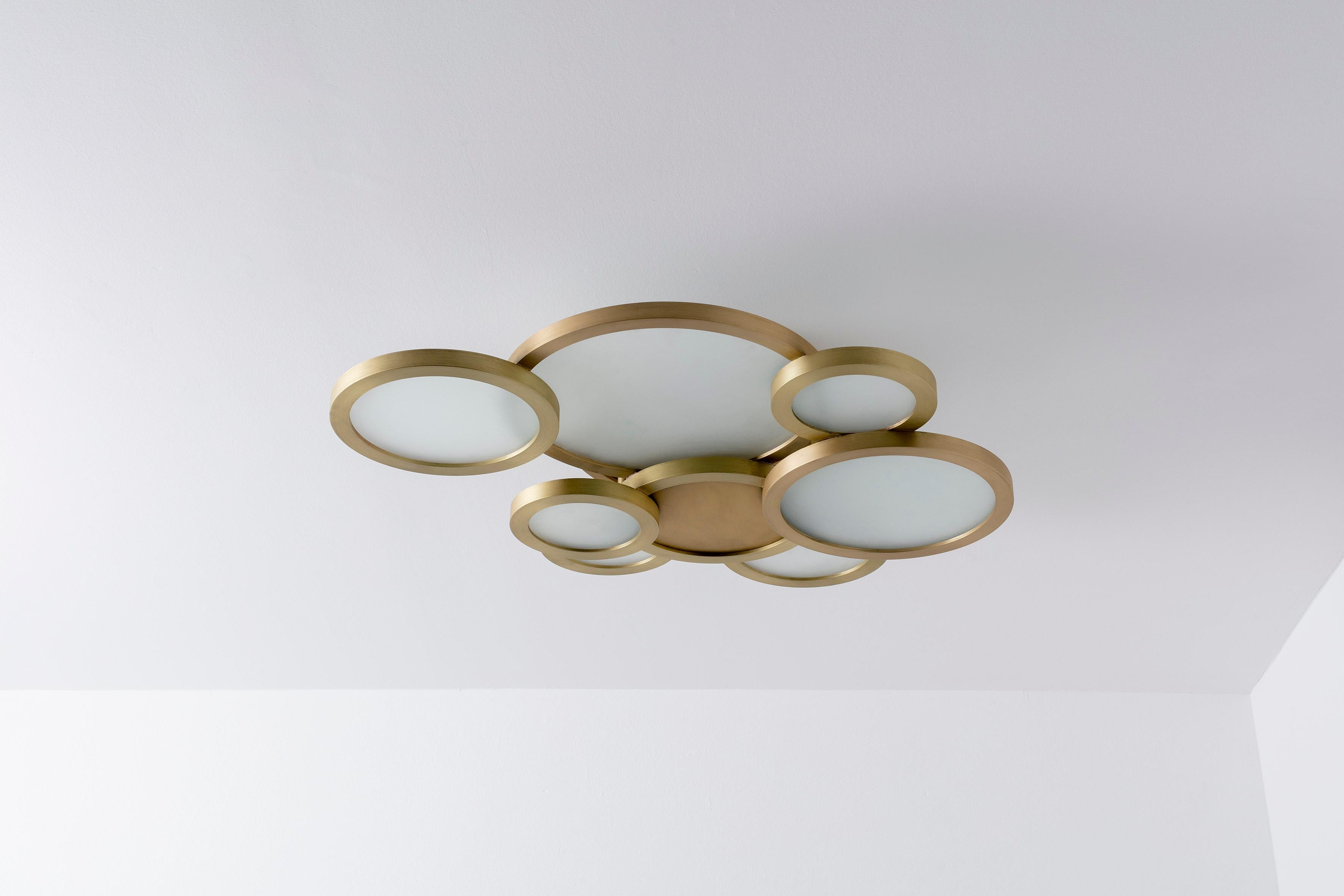 Cloud ceiling mounted brass - Carla Baz
Dimensions: L 75 x W 58 x H 16 cm
Weight: 16 kg
Material: Brass

Cloud light series are hand crafted in black painted steel or sand casted brass. The parts are individually made by hand then carefully