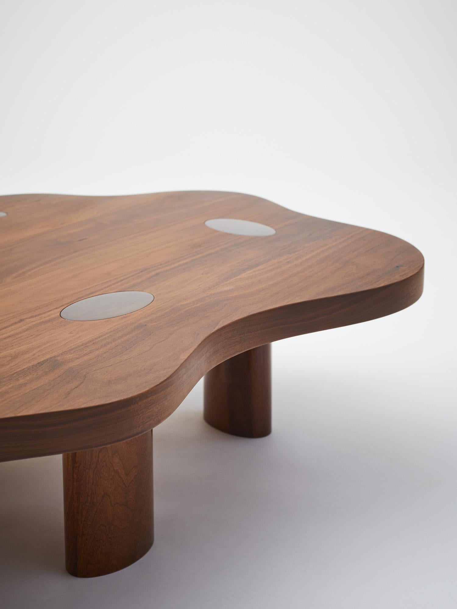 Cloud coffee table large in walnut finished with a satin clear coat / hi-gloss lacquer. 

Designed by Lousie Liljencrantz, Interior Designer based in Stockholm Sweden. 
Made in Sweden.