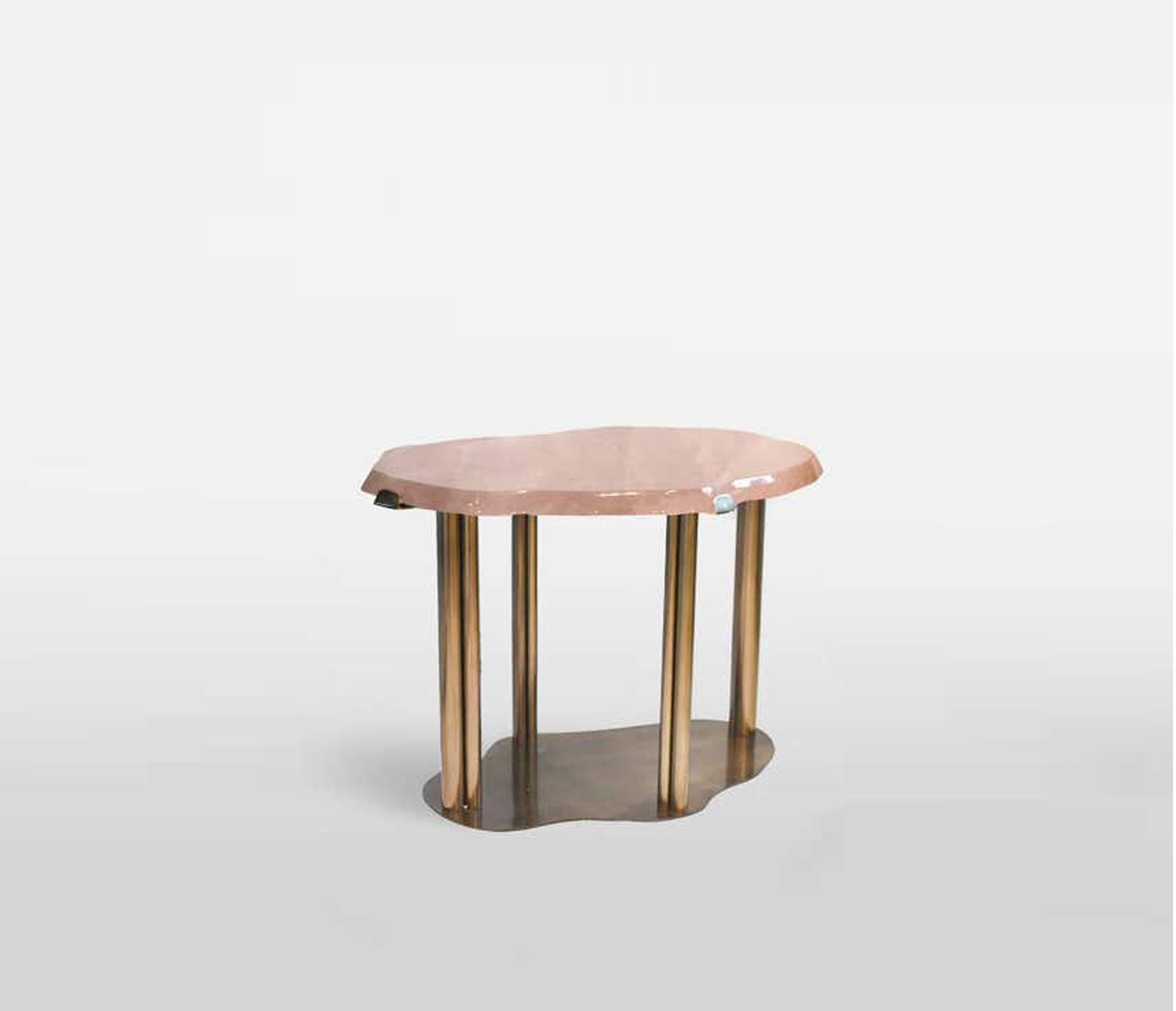 A fine carved cloud form rose rock crystal quartz cocktail table with antique brass finish. Created by Phoenix Gallery.
The listing price is $7,300. 