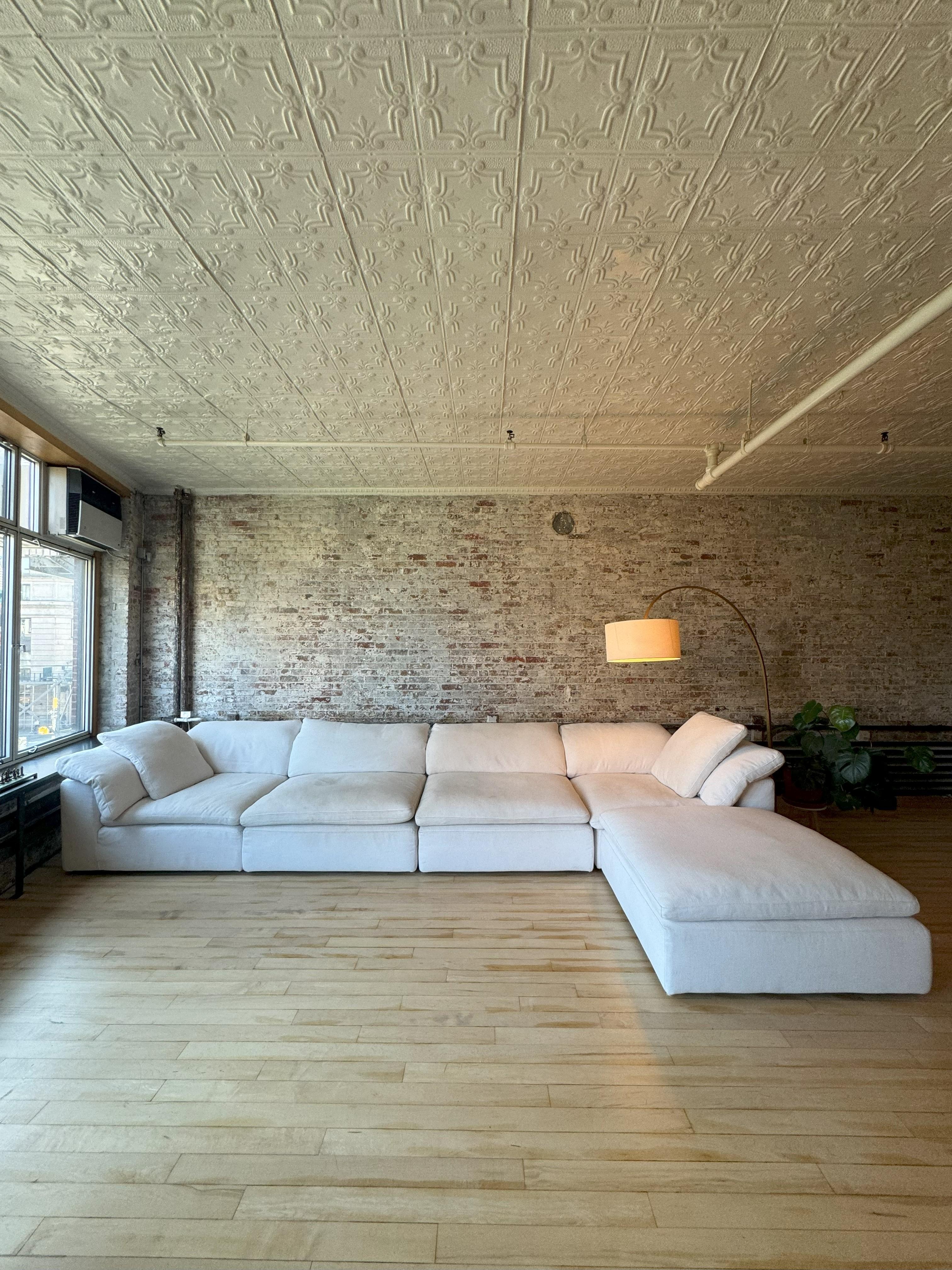 RH Cloud Sectional Sofa In Luxe Perennials Performance Textured Linen Weave White Fabric.

158