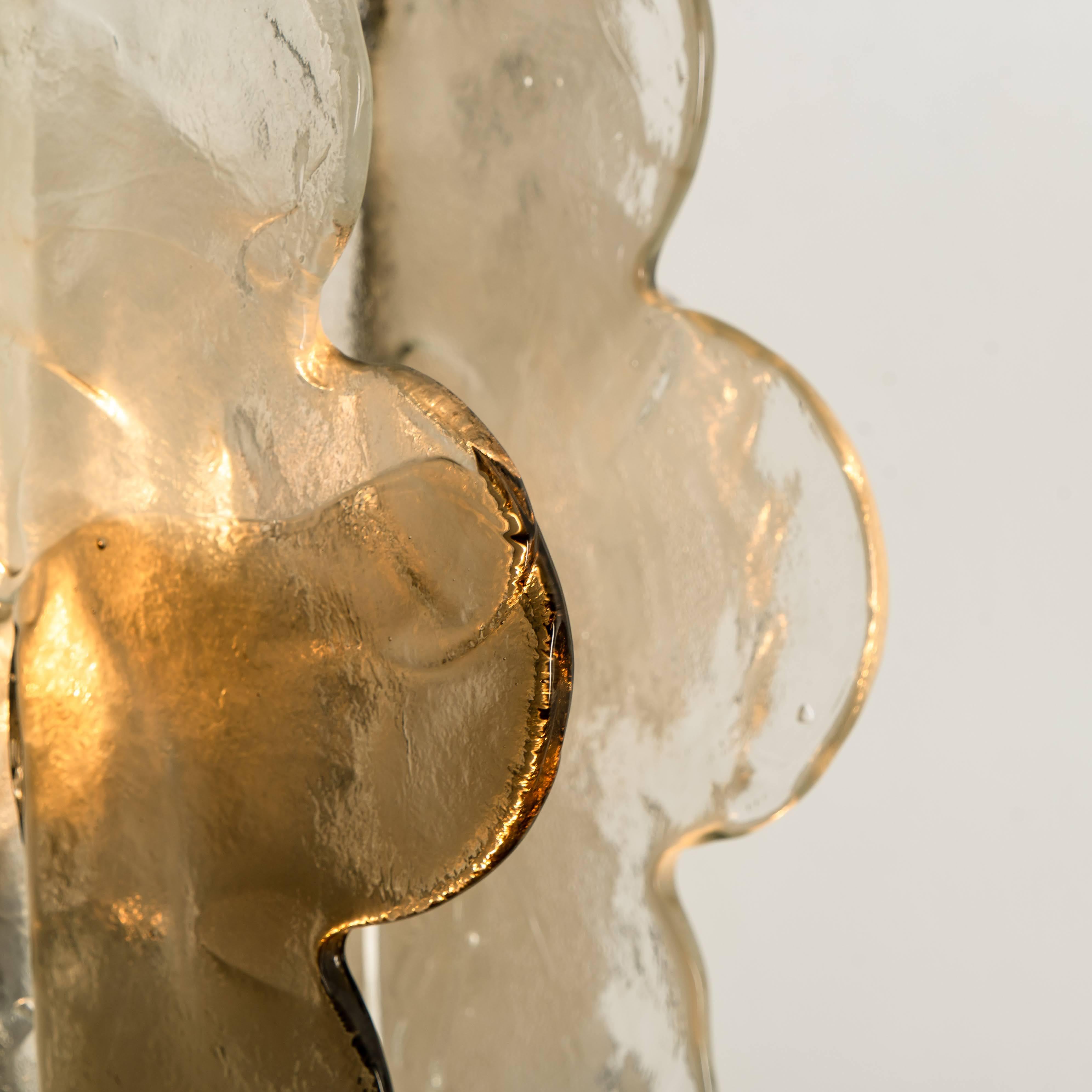 Unique Murano floor lamp, designed by Carlo Nason for Mazzega. Manufactured in circa 1970 (late 1960s and early 1970s),
circa 1970. Made with four interlocking glass panels in clear and smoked glass, which are mounted on a nickel-plated base.