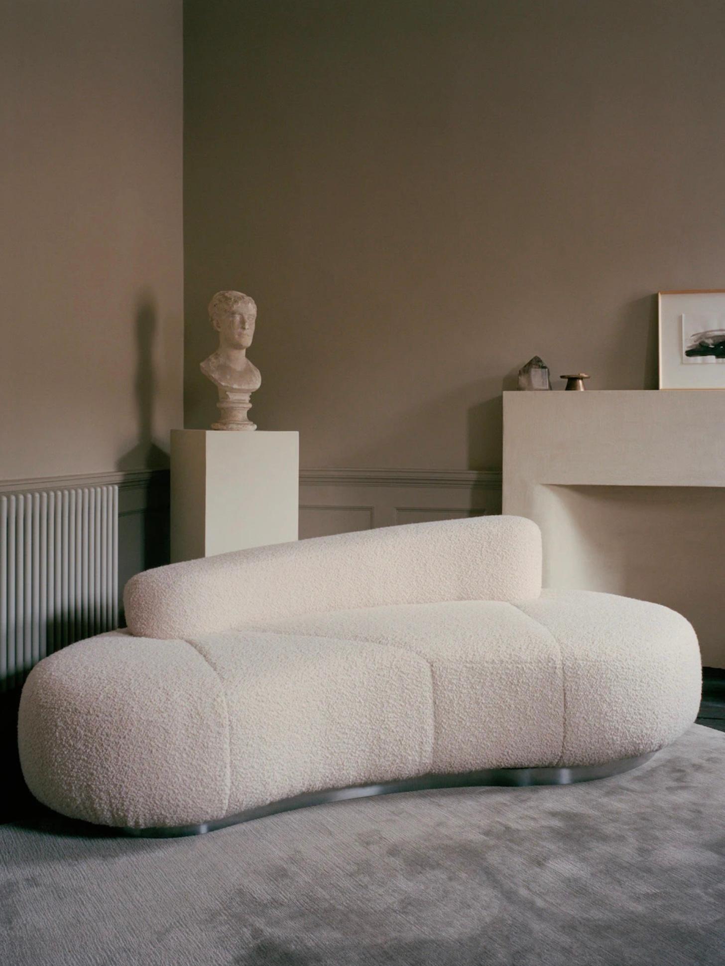 Cloud sofa by Fred Rigby Studio.
Dimensions: L 216 x W 140 x H 67 cm.
Materials: boucle weave fabric.

The Cloud Sofa, from the Francis x Fred Rigby furniture collection, has been designed to recreate the imagined softness and comfort of sitting