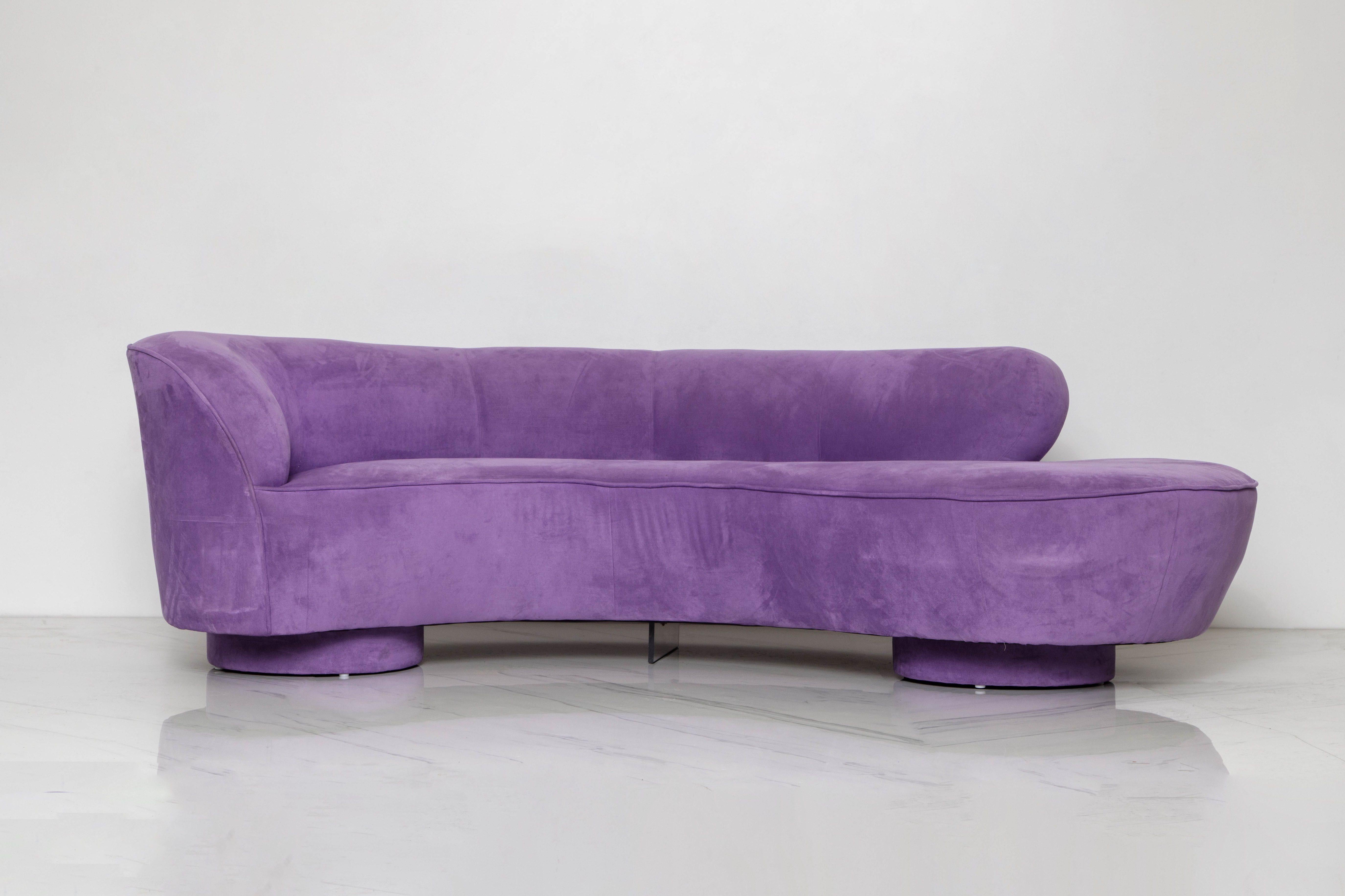 This mesmerizing Vladimir Kagan 'Cloud' sofa was produced by Directional in circa 1980 and is in its original soft lavender colored Alcantara fabric with lucite center leg, signed underneath with Directional label. Such on-trend color, just imagine