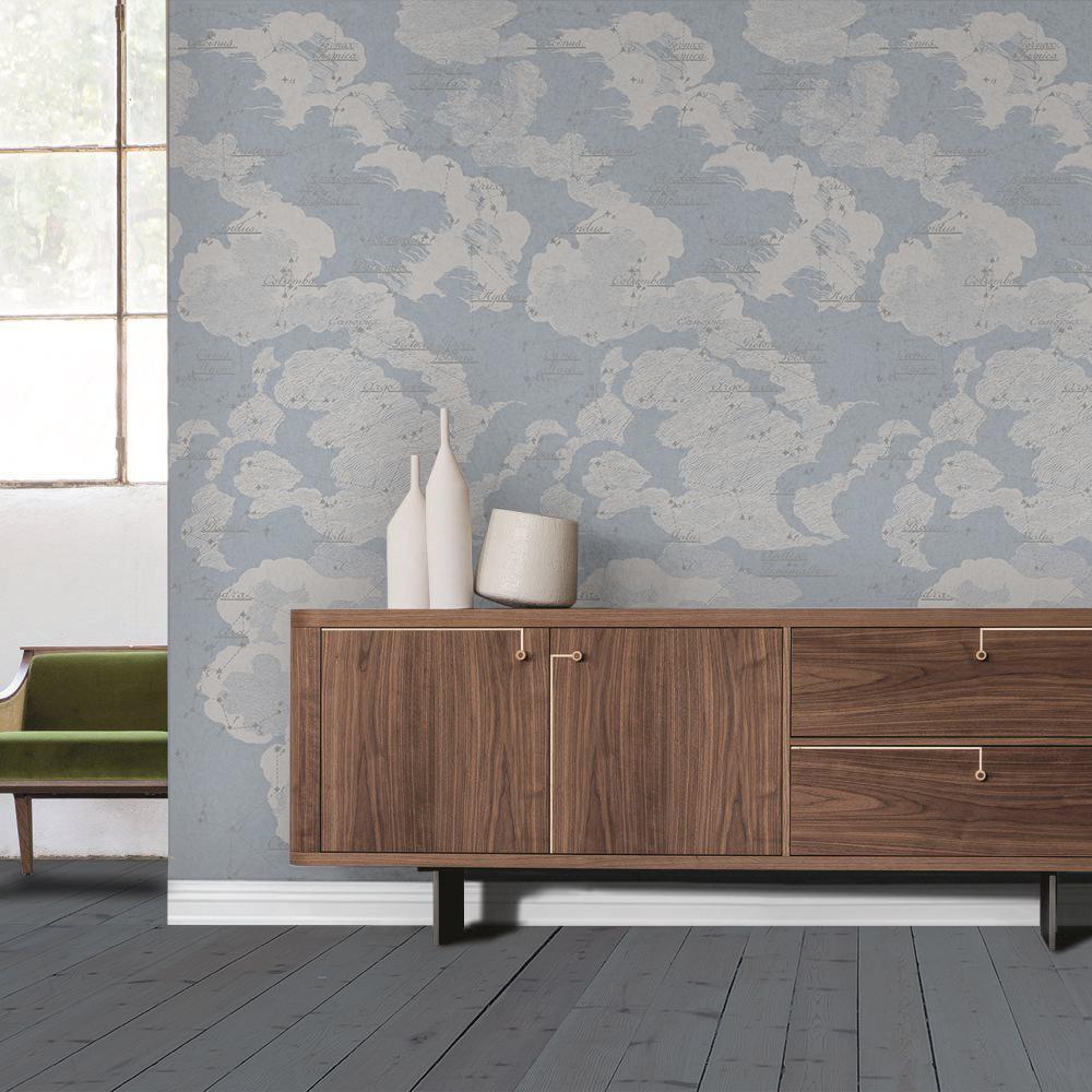MINIMUM ORDER 4 ROLLS FOR A TOTAL OF 44 YARDS.

Taking inspiration from a nineteenth century star chart of the Southern Hemisphere and eighteenth century etchings,
we have created a graceful nocturnal sky of clouds and constellations.
Available in