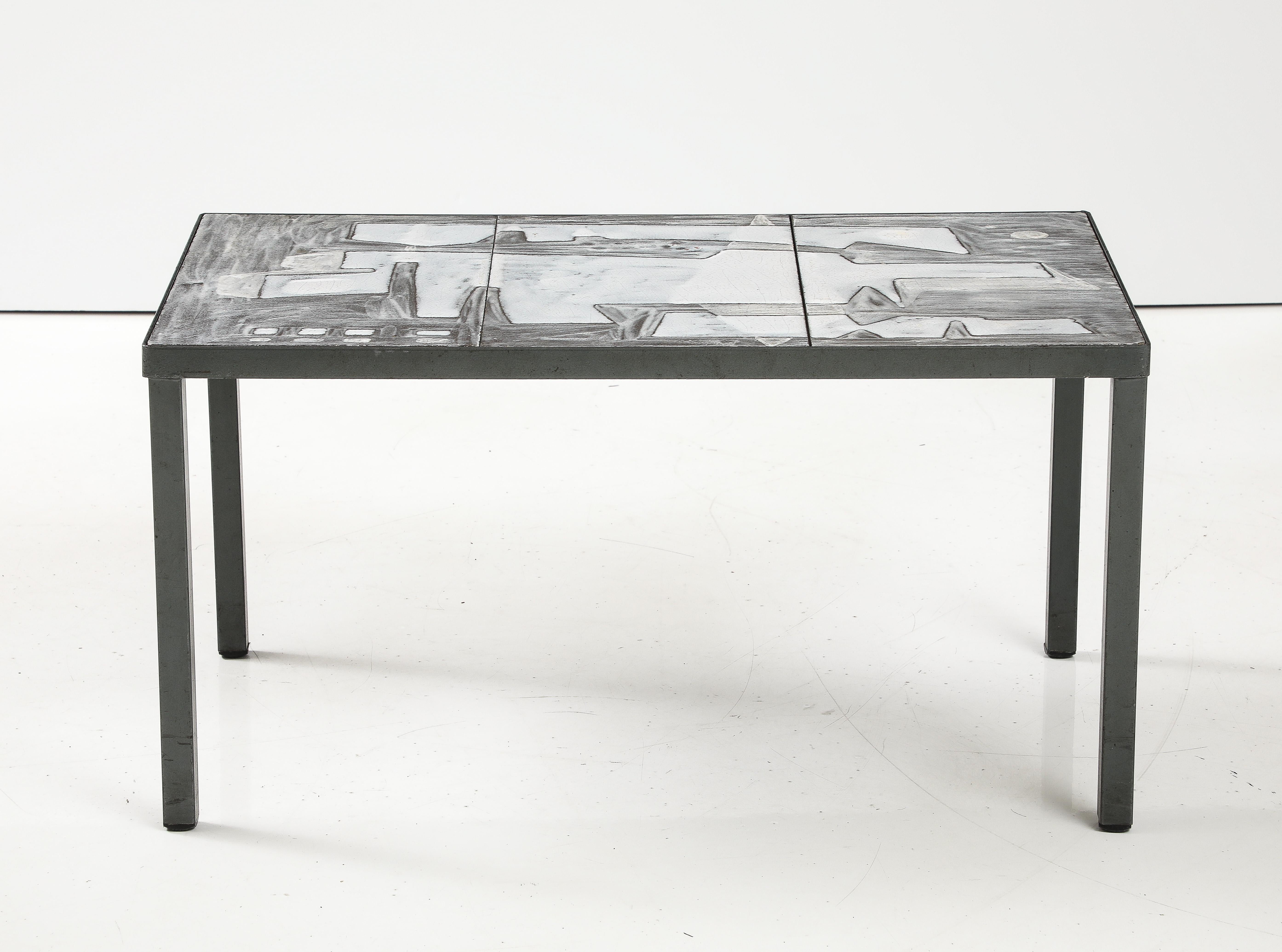 Robert (1930-2008) & Jean (1930-2015) Cloutier
Lava Stone Tile Top Coffee Table in white grey abstract design
H: 15.5 D: 18 W: 30 inches

It is special in that is the white and grey series, and the white is slightly in relief