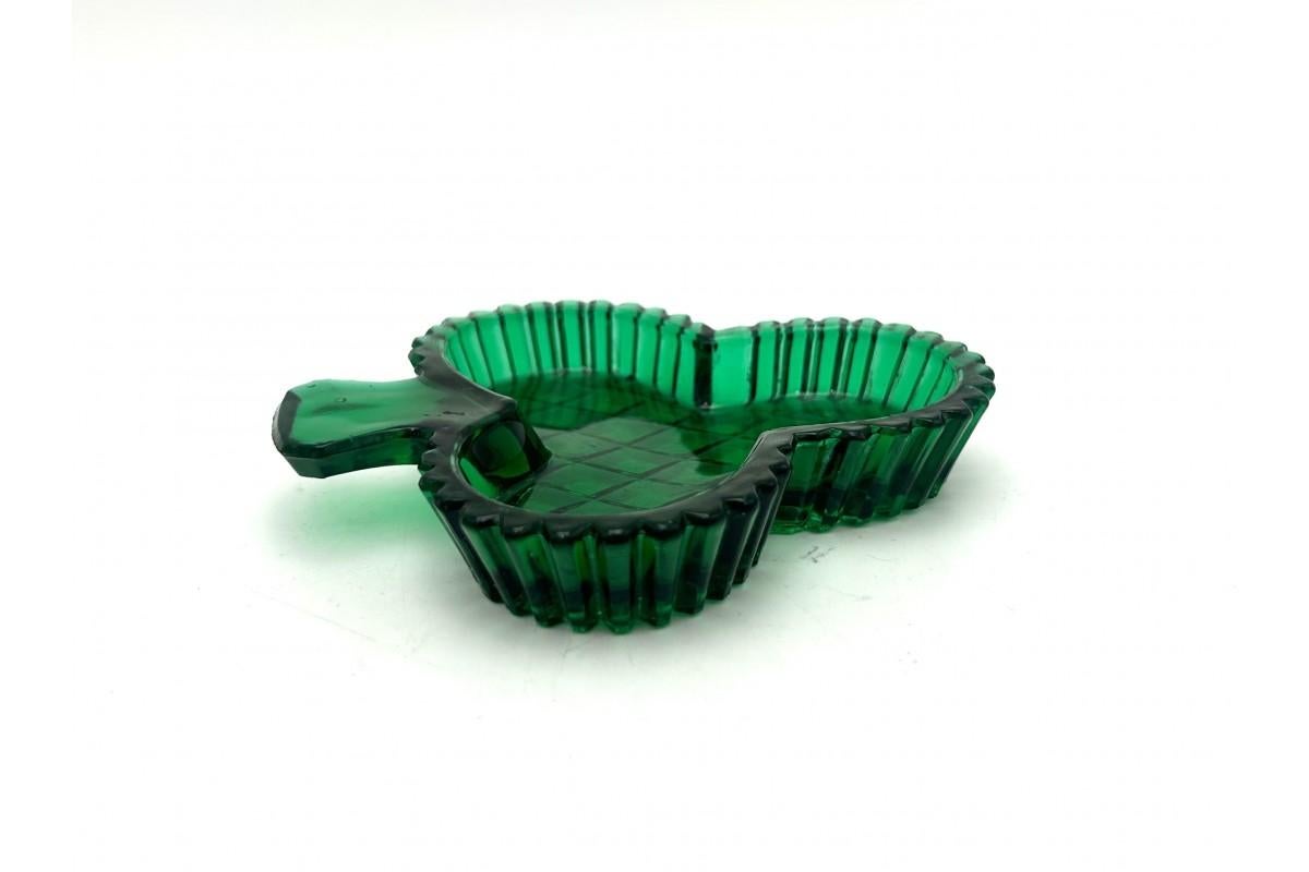 Green glass club ashtray in the shape of a clover

Produced by HSG 