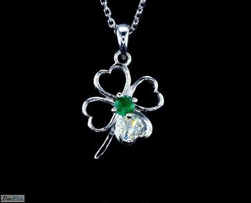 Limited Edition Four Leaf Clover Pendent. 
According to Irish tradition, four-leaf clover gives good luck to his finder, as each leaf in the clover symbolizes good omens for faith, hope, love, and luck. 
This Exquisite handcrafted pendent is set