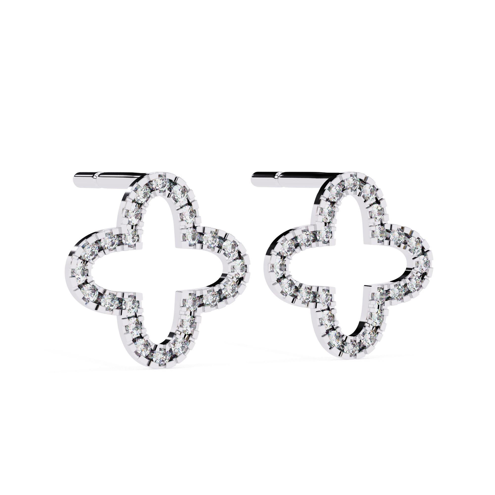 Élevez votre élégance avec les clous d'oreilles en diamant Radiant Clover, réalisés en luxueux or blanc 14 carats pesant 1,8 gramme. Ces boucles d'oreilles sophistiquées présentent un gracieux design en forme de trèfle, orné de 0,288 carats de