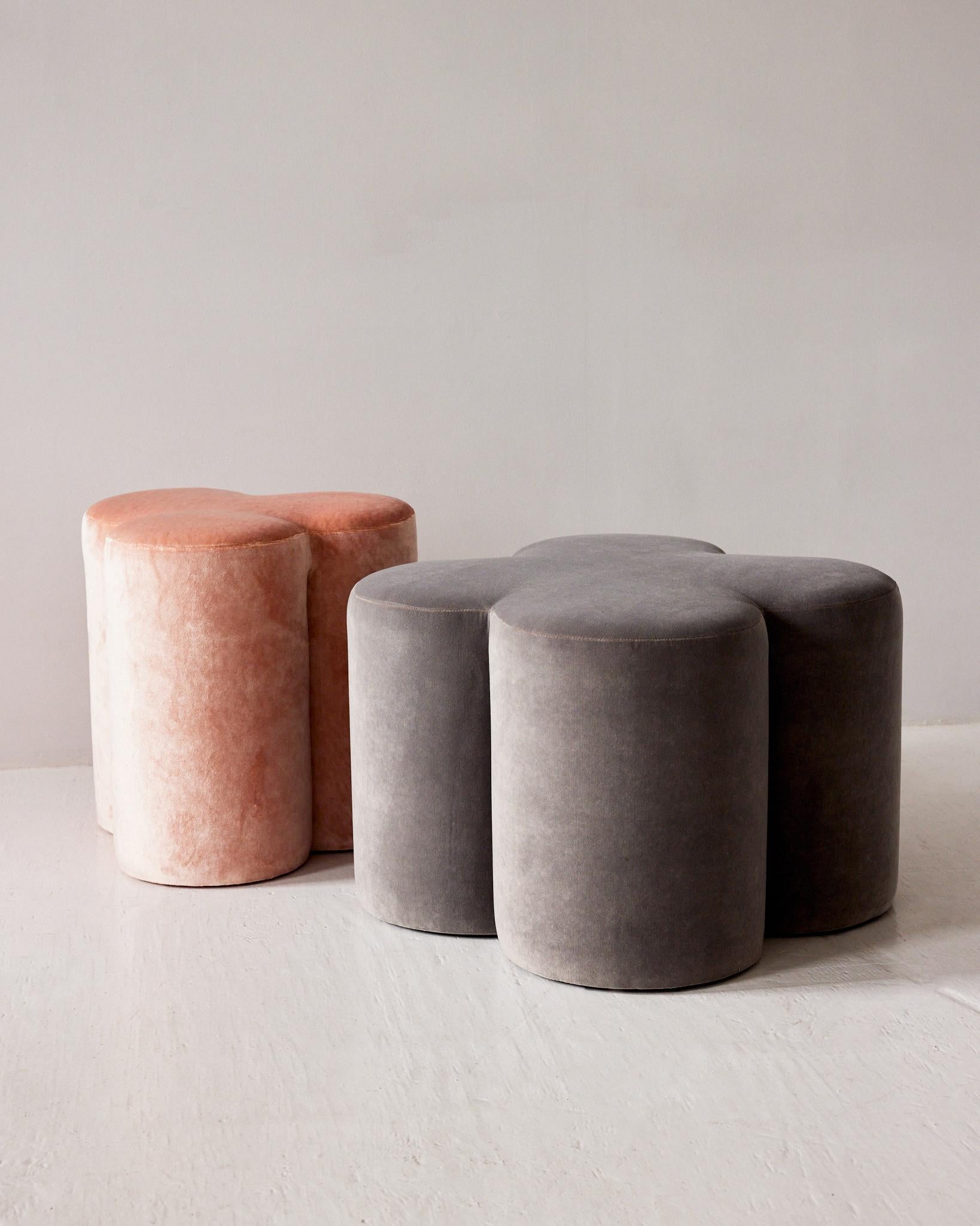 Your lucky charm for any space. 

The Clover Upholstered Pouf in a can’t-stop-touching-it, soft gray cotton velvet is designed to fit anywhere you might need a quick pop of color, softness or texture. 

Works well on its own, or paired with our Lily