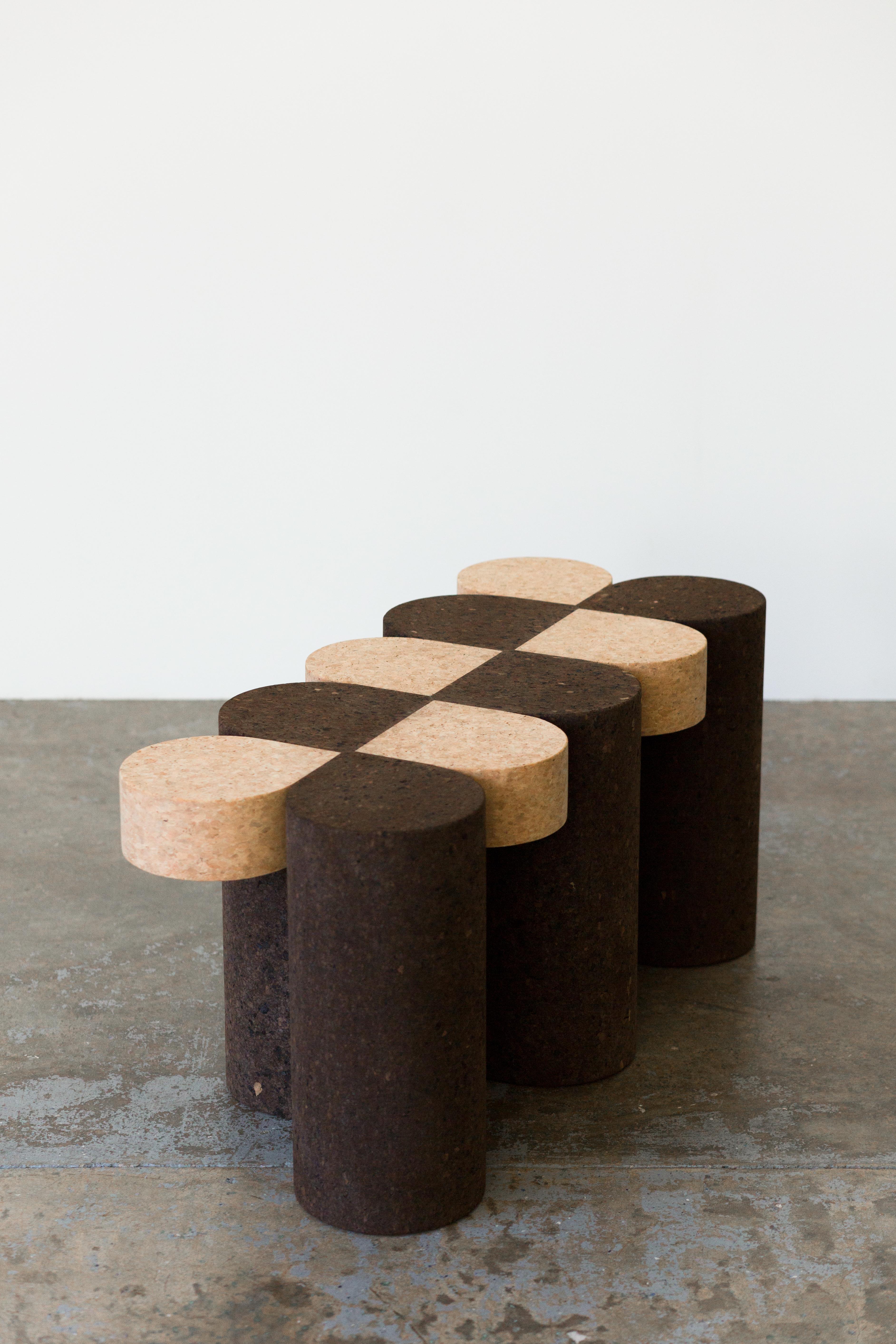 A realization of meticulous research, this piece is part of a collection that highlights the formal longevity and environmental sustainability of Mediterranean cork.

Monolithic and inviting, it is cut from the cylindrical forms that are standard