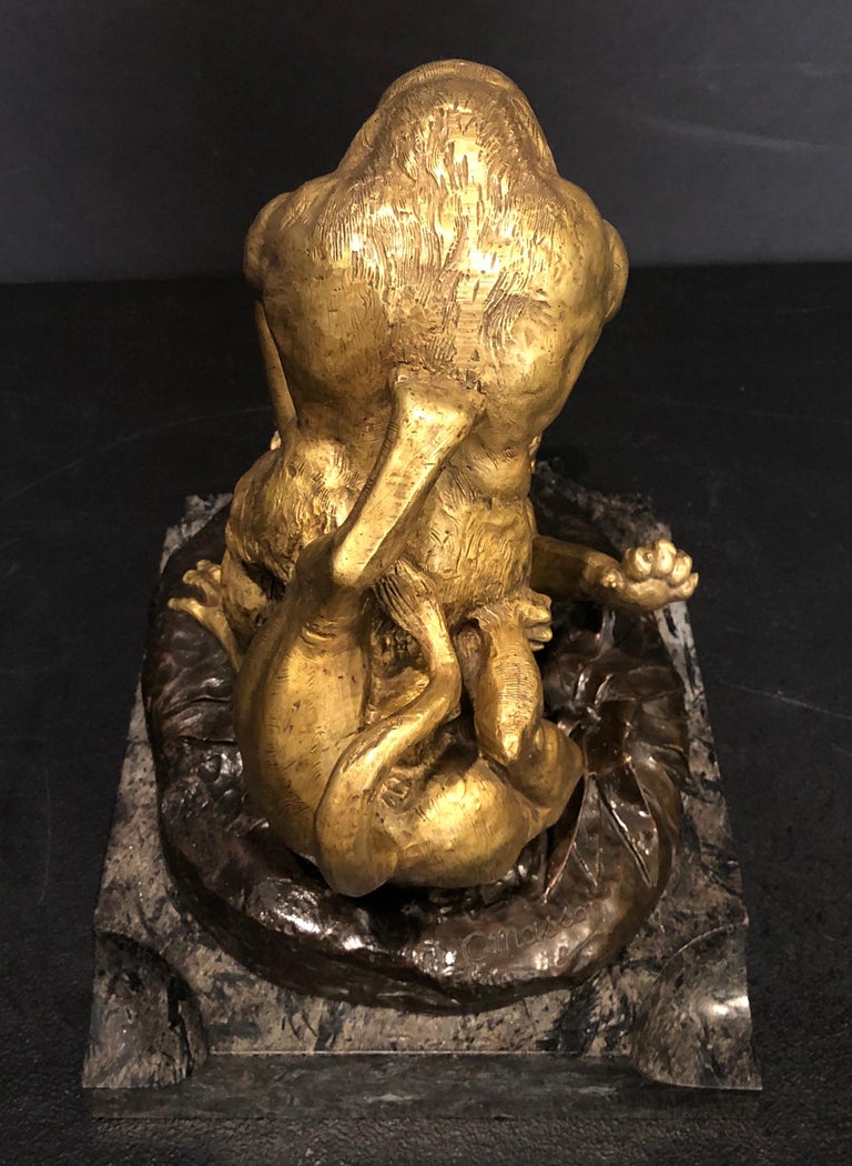 Clovis Edmond Masson (1838-1913) sculpture of gorilla in battle with lion. 19th century gilt and patinated bronze mounted on marble base.