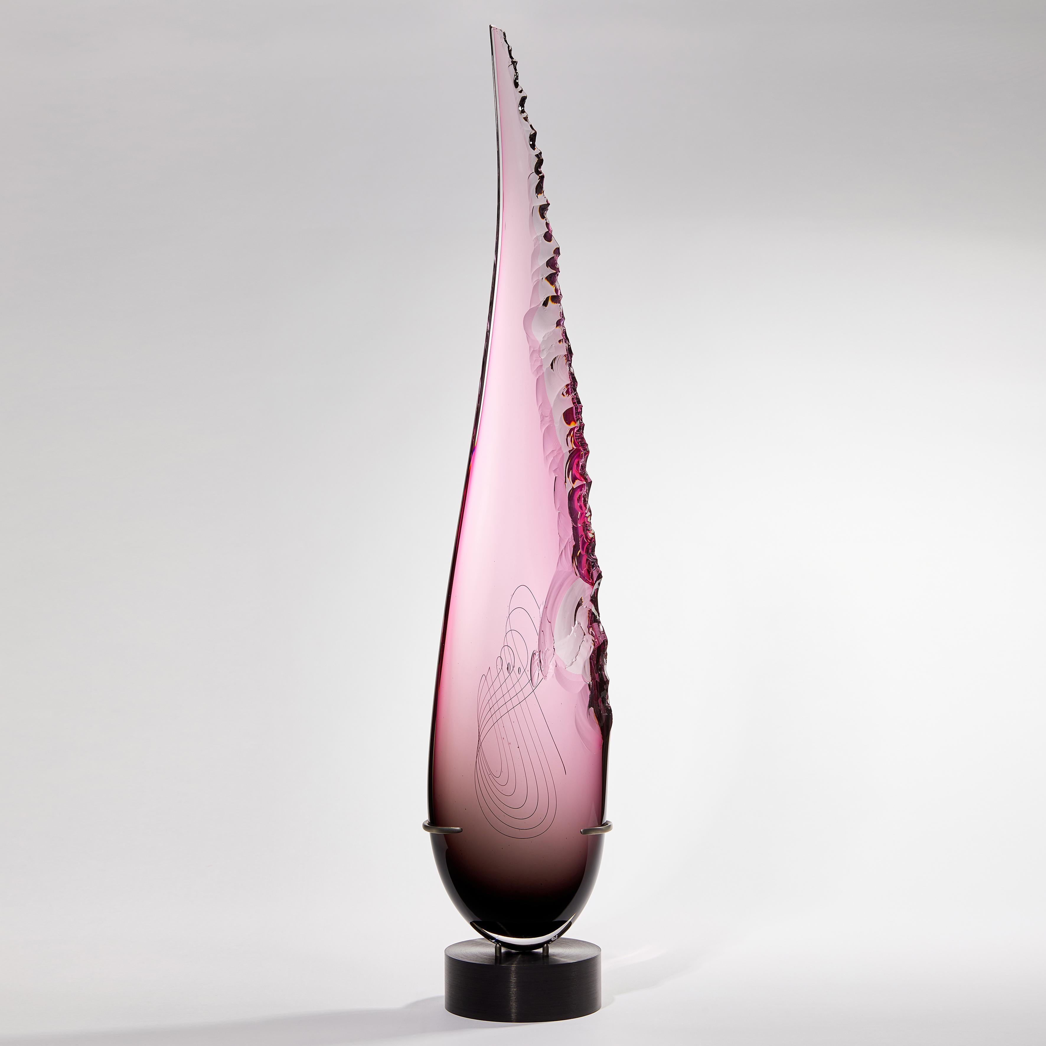 'Clovis in Grey to Ruby' is a unique tall glass sculpture by the British artist James Devereux.

Refinement and daring combine within this statuesque sculpture. Poised upon a museum-quality patinated steel base, the eye is drawn upwards, taken by