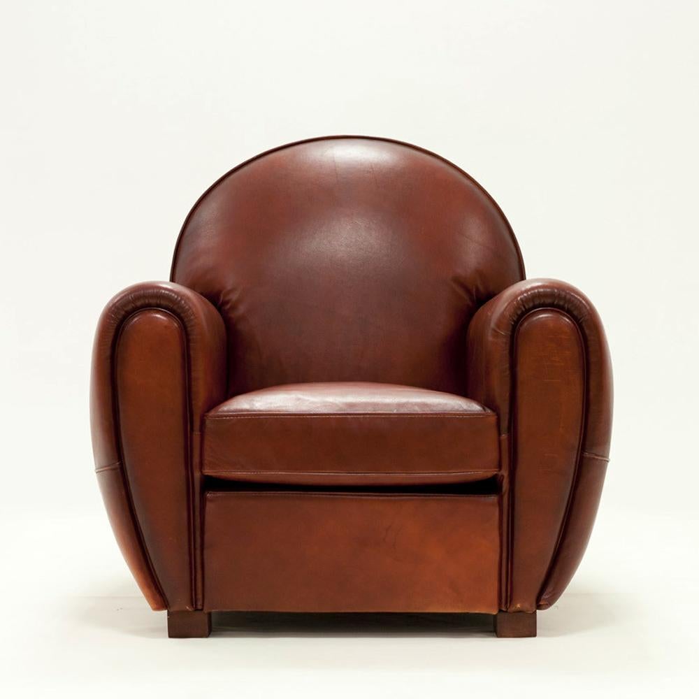 Armchair club with natural brown genuine
leather and with structure in solid wood. Upholstered
and covered with high quality natural genuine leather.
Totally handmade piece.
 
