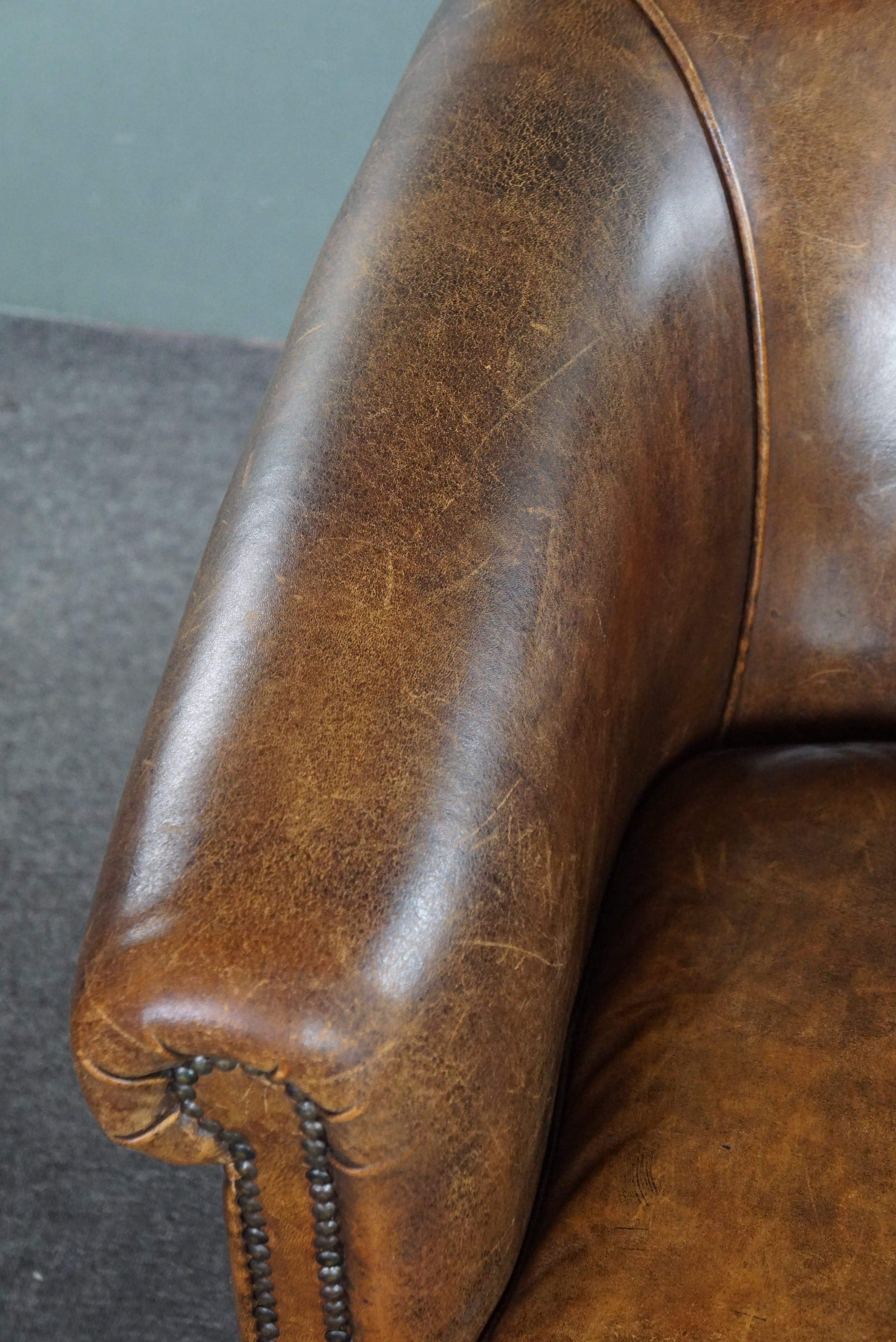 Club armchair with patina, made of sheep leather For Sale 1
