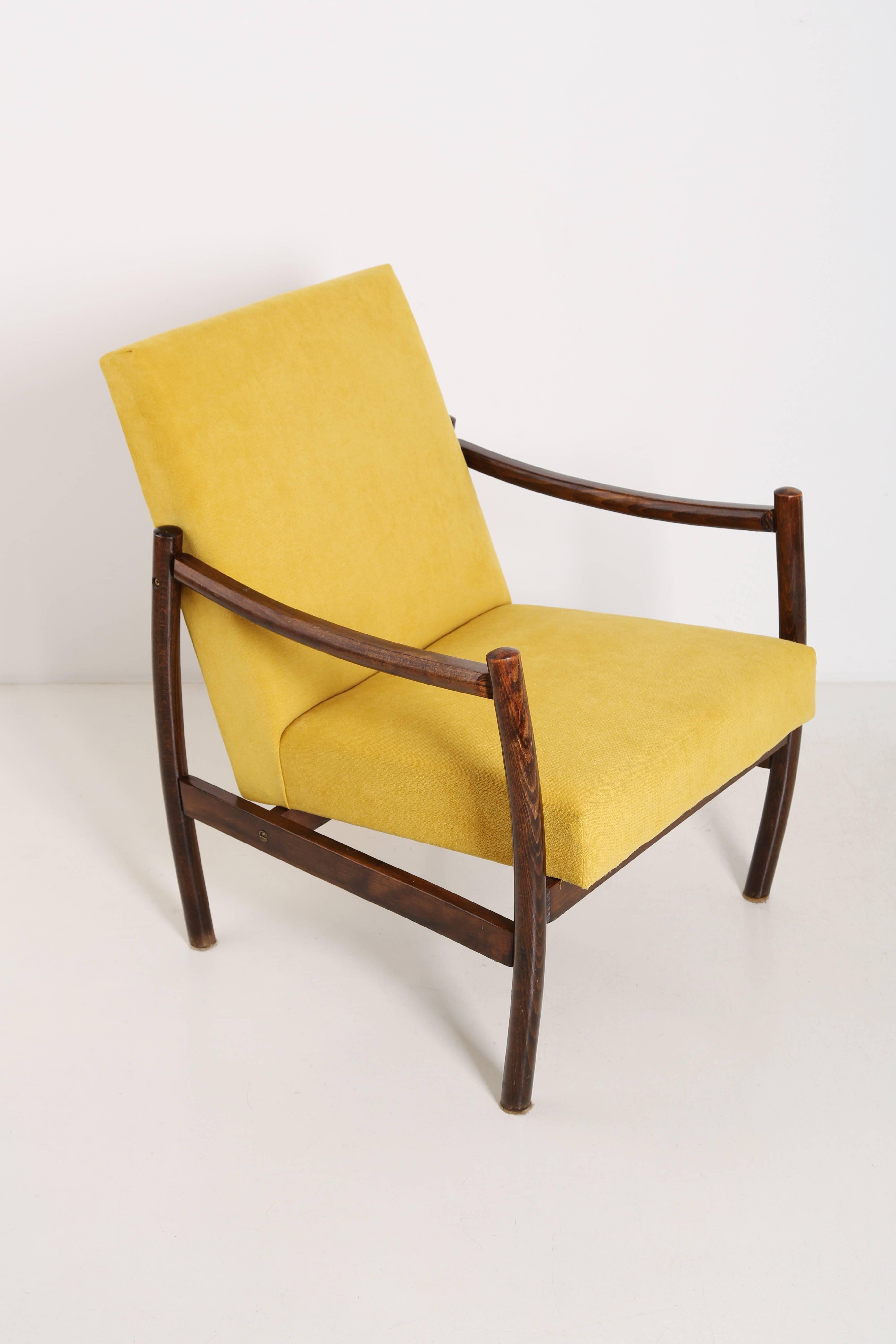 Armchairs produced in the 1960s by Radom Furniture Factories. Very comfortable seat covered with high quality fabric. The armchairs are fully carpentry and upholstery. We can prepare other color versions of fabrics. This is price per one armchair. 