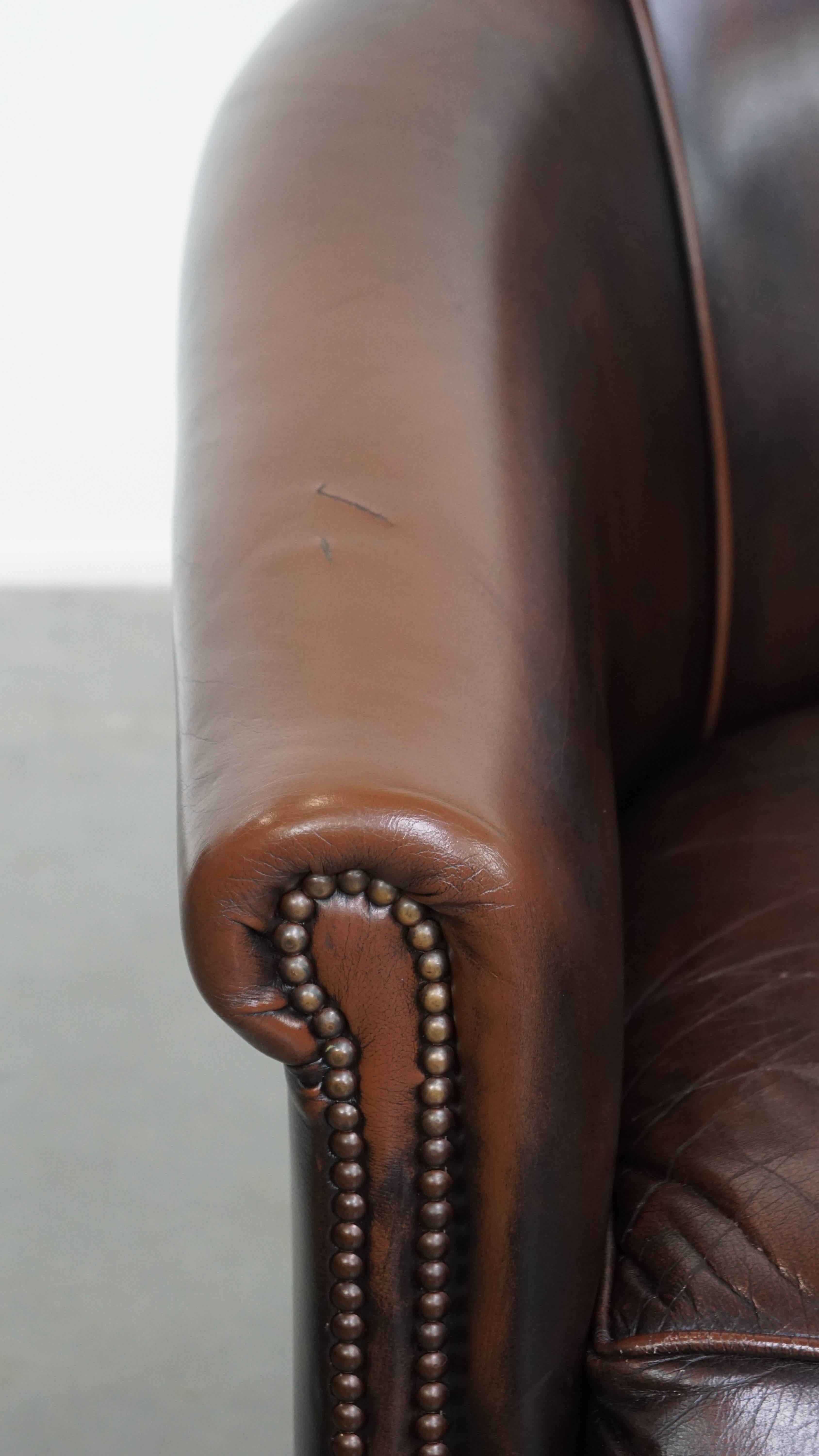 Fauteuil club en cuir de vachette de couleur foncée en vente 3