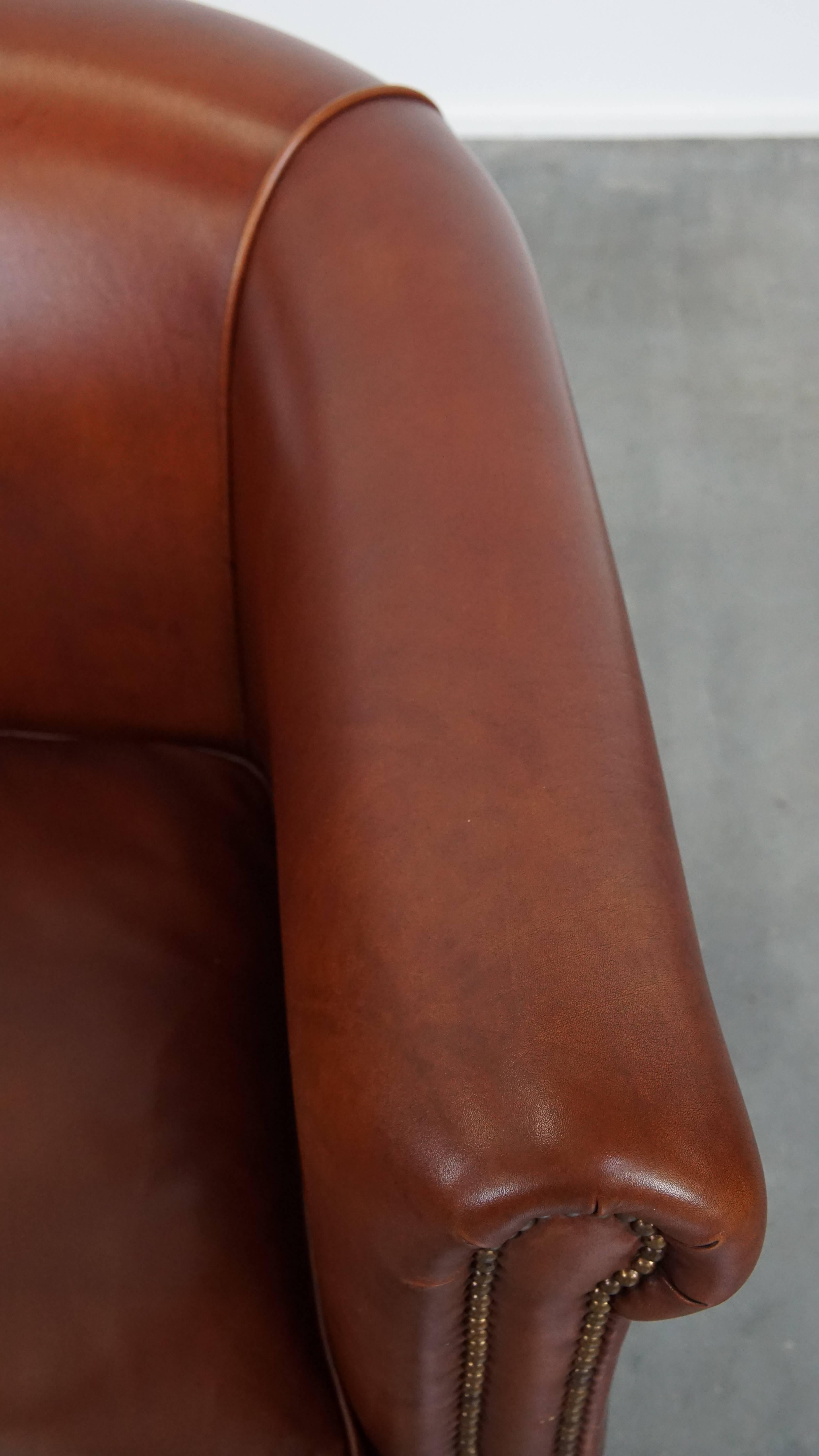 Fauteuil club en cuir de vache en vente 1