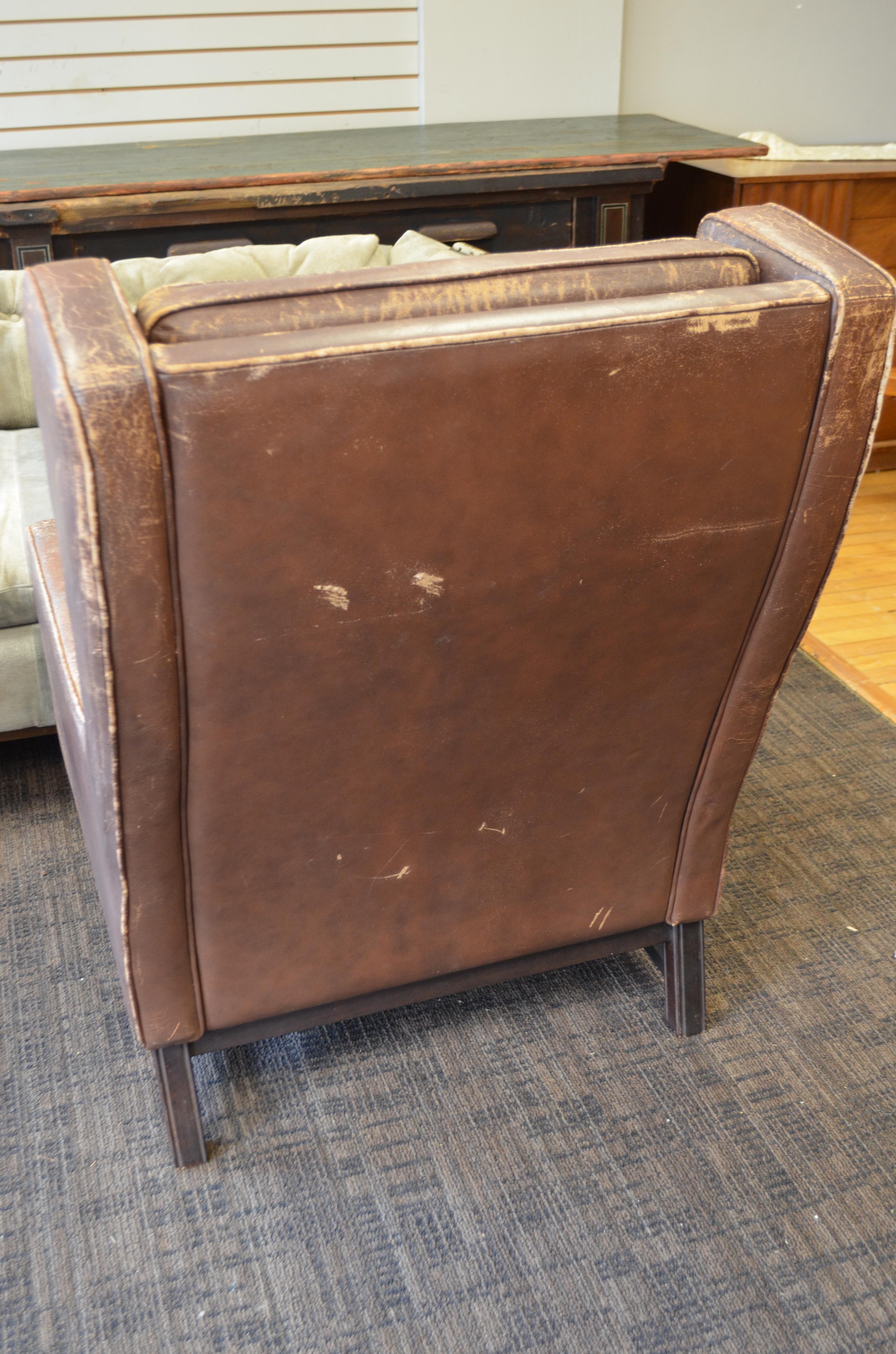 Club Chair of Worn Leather from Edwardian England, Wingback, Early 20th Century For Sale 6