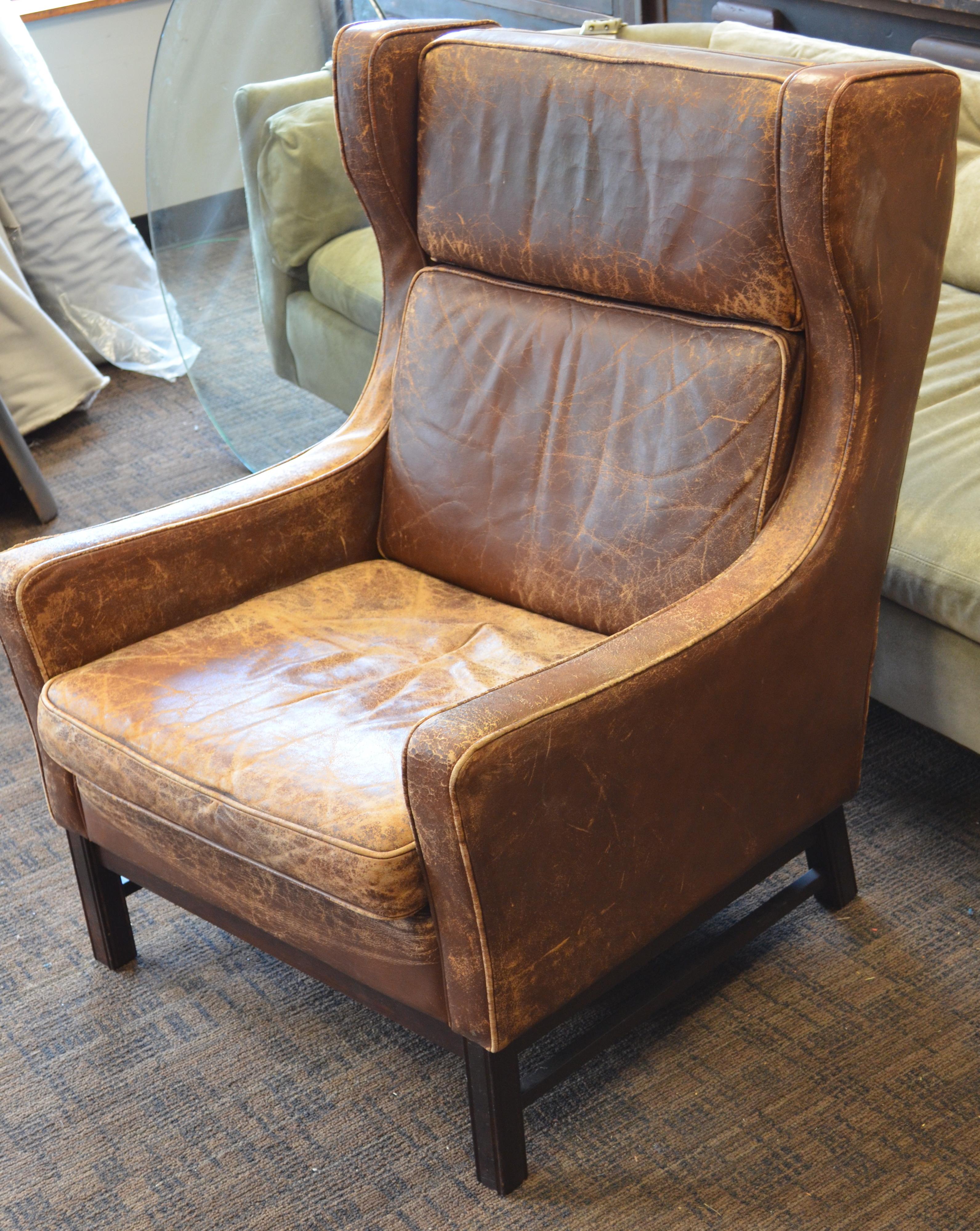 Club Chair of Worn Leather from Edwardian England, Wingback, Early 20th Century For Sale 3