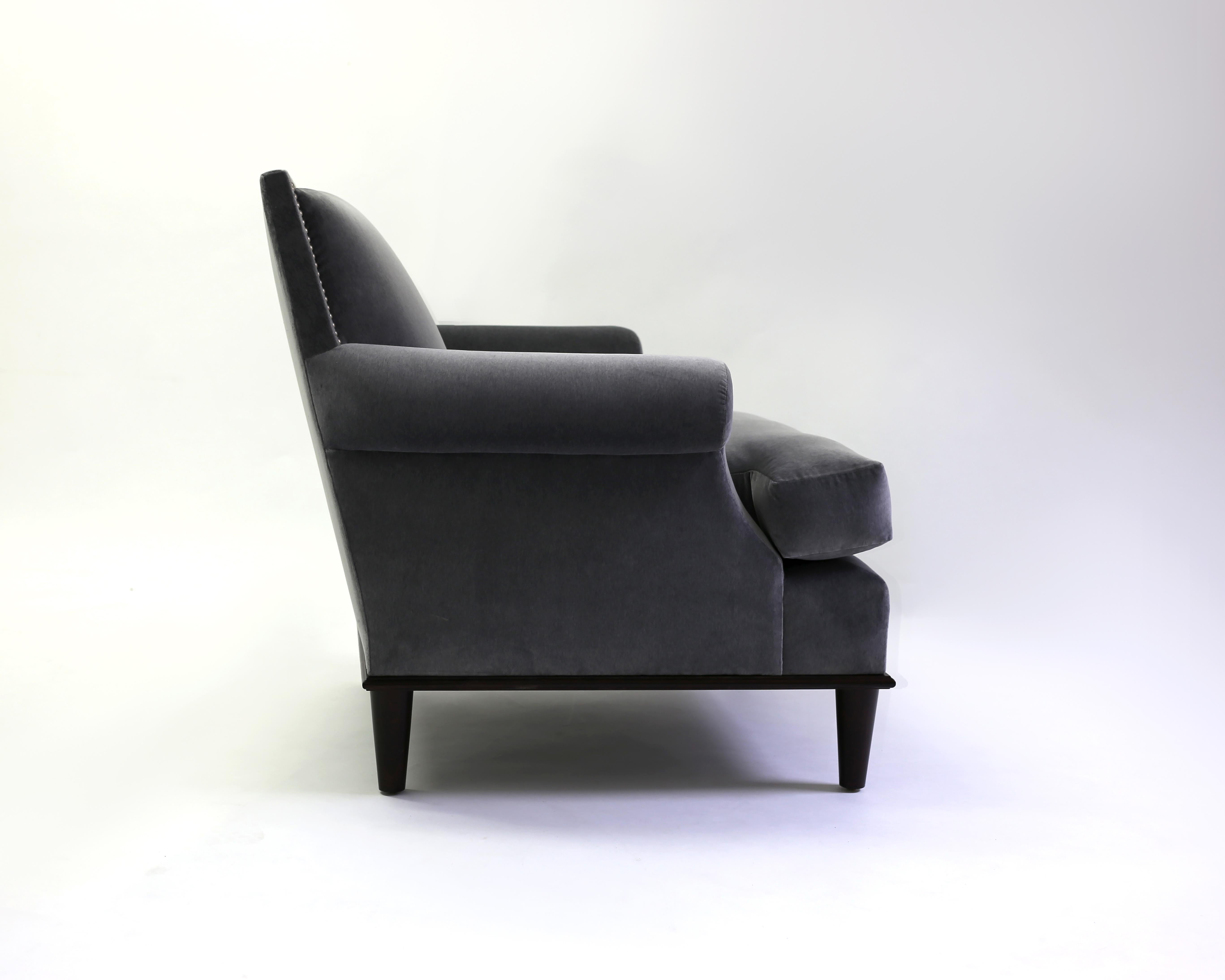 The Lorraine club chair is the LF Collection variation on the timeless Jansen style club chair - with the square back trimmed with either French natural or pewter nailheads - padded scroll arms with soft foam cushion with clean seams - this elegant