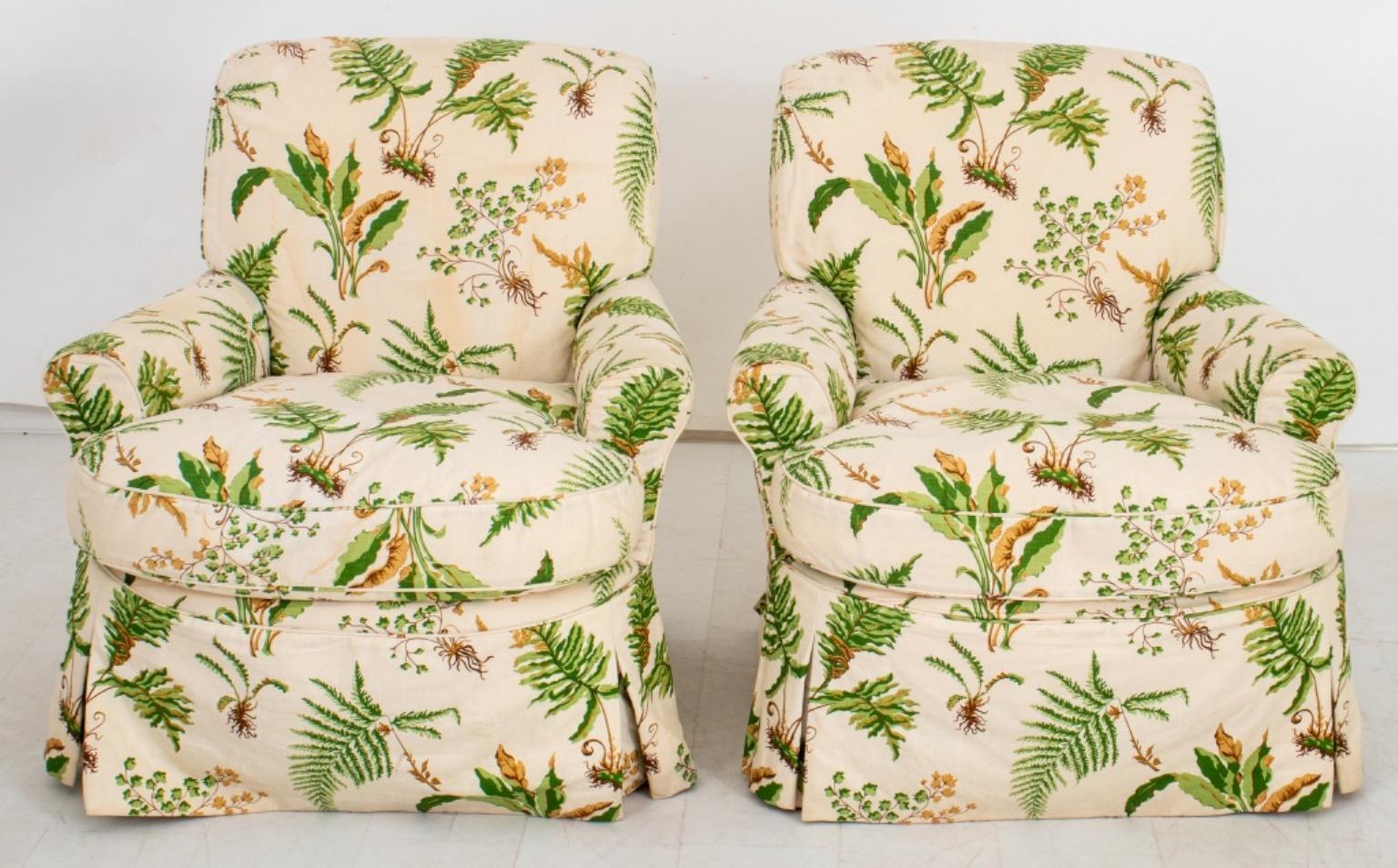 Pair of small club chairs by Parrish-Hadley, covered in Elsie de Wolfe-inspired botanical fern printed cotton linen (light staining). 2, the chairs likley Brunschwig & Fils.

Dimensions: 31