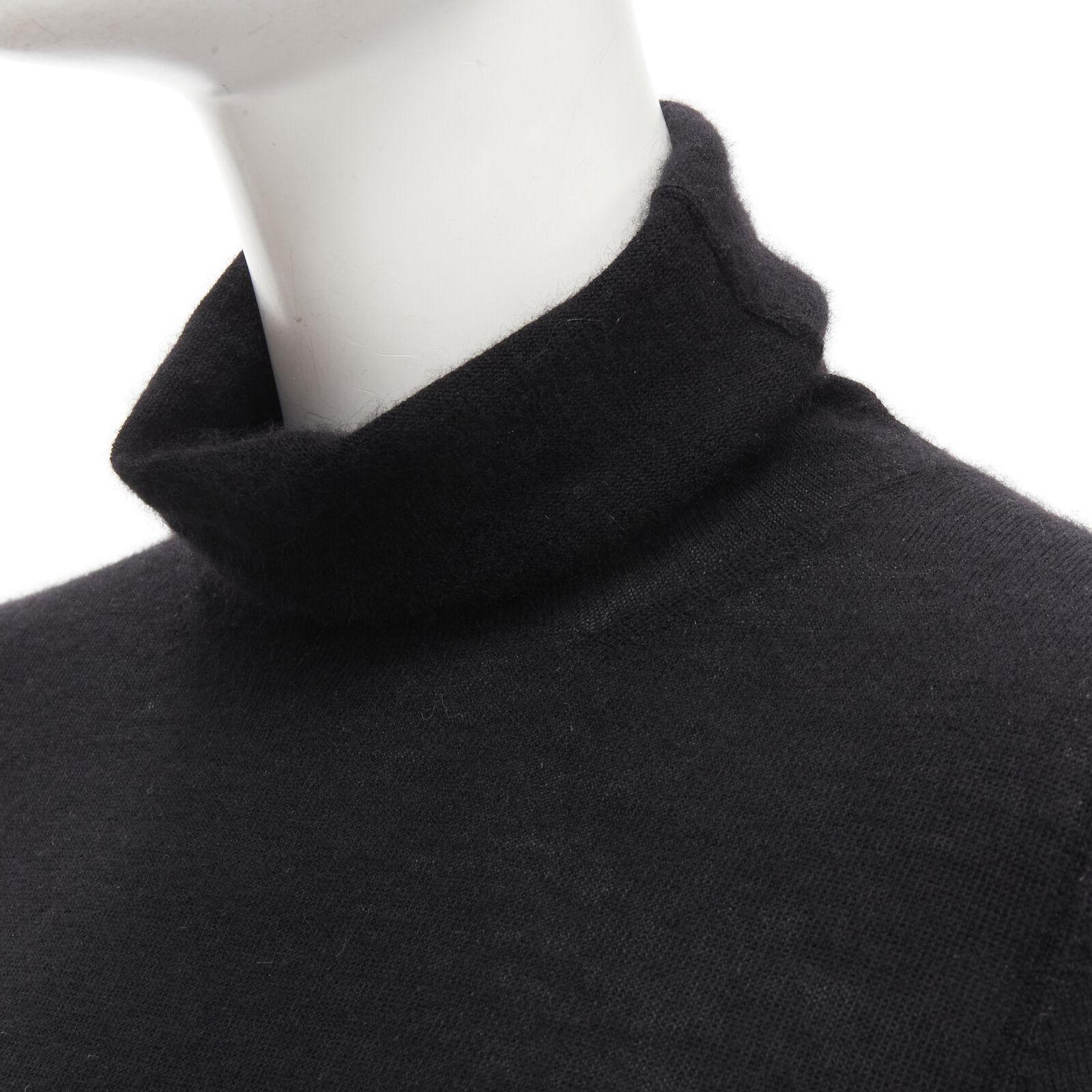 CLUB MONACO 100% Italian cashmere black turtleneck long sleeves sweater S
Reference: LNKO/A02068
Brand: Club Monaco
Material: 100% Cashmere
Color: Black
Pattern: Solid
Closure: Pullover
Made in: China

CONDITION:
Condition: Good, this item was