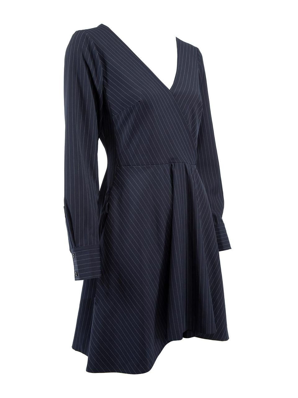 CONDITION is Never Worn. No visible wear to dress is evident on this used Club Monaco designer resale item. 
 
 Details
 Navy
 Polyester
 Skater style
 Long sleeves 
 V neckline
 Zip fastening 
 
 
 Made in CHINA
 
 Composition
 91% POLYESTER, 7%