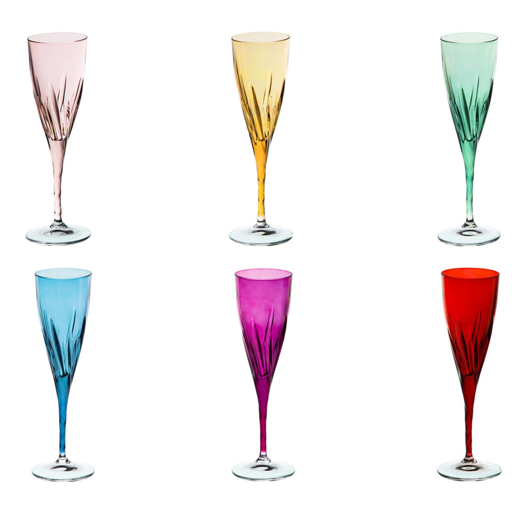 This stunning champagne flute set is part of the Club collection. Each piece was crafted of glass and decorated by hand, boasting a transparent round foot supporting a stem and bowl with striking creases to add a textural decoration. The individual