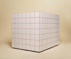 Club Tile Chair, a swiveling matte tiled chair with faux shearling upholstery