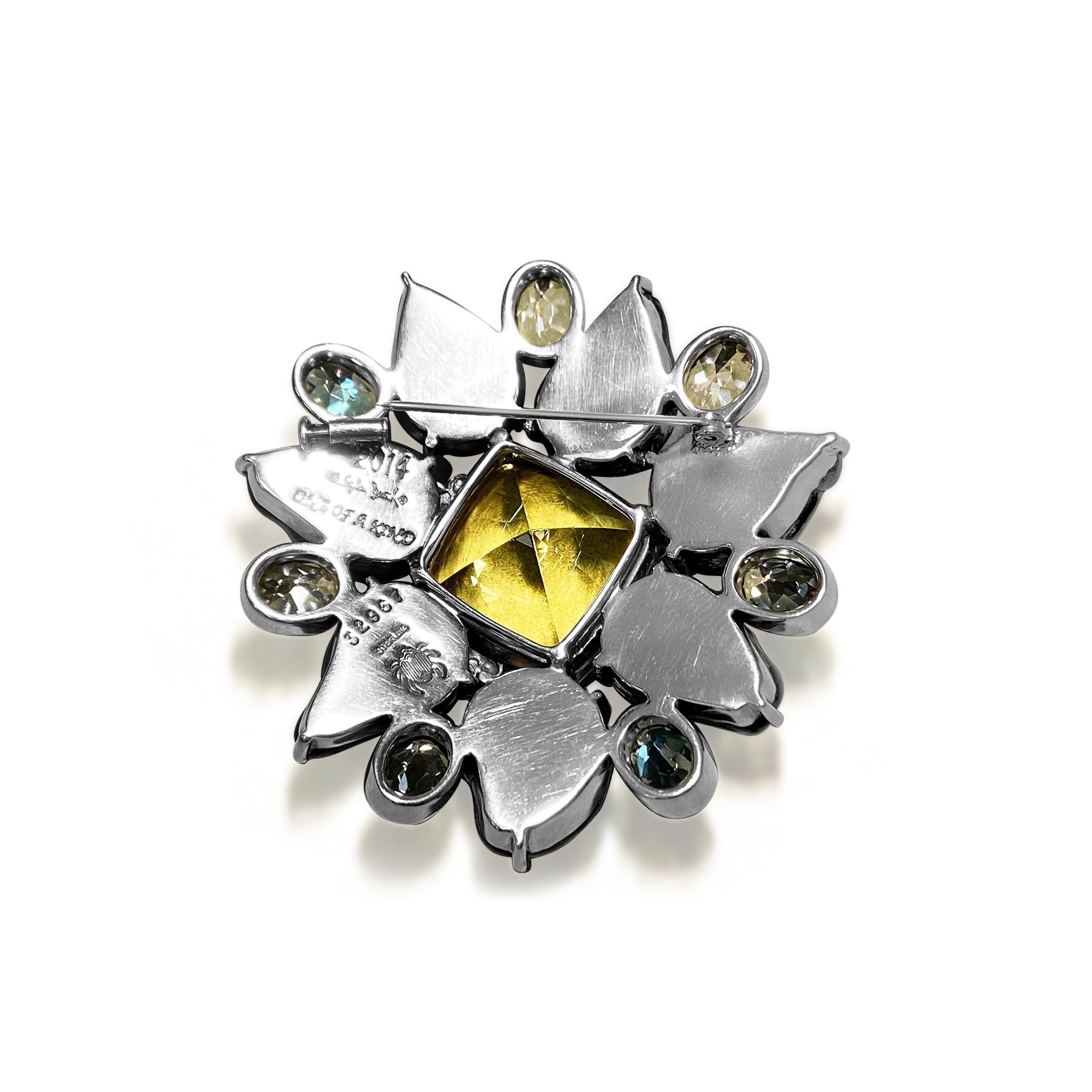 One of a Kind: A clustered broach set with faceted lemon quartz and surrounded by peacock pearls

