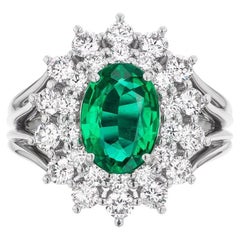 Cluster Diamond and Emerald Ring