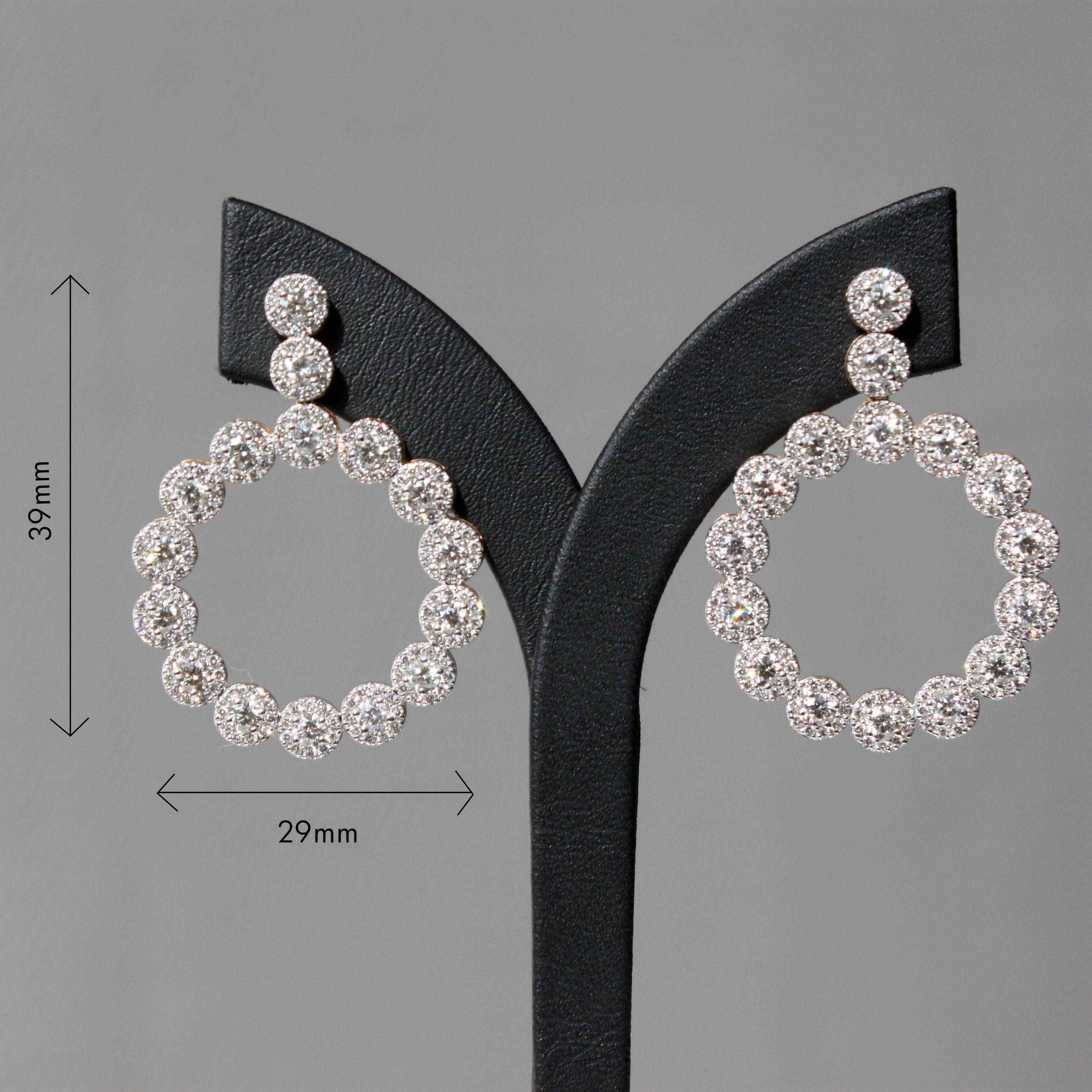 14K gold
5.27ct natural diamonds VS-SI quality and Top Top light brown (TLB/ TTLB) colour
Total earring weight 10.91 g

Embrace timeless sophistication with our exquisite diamond cluster earrings, a quintessential classic redefined with subtle