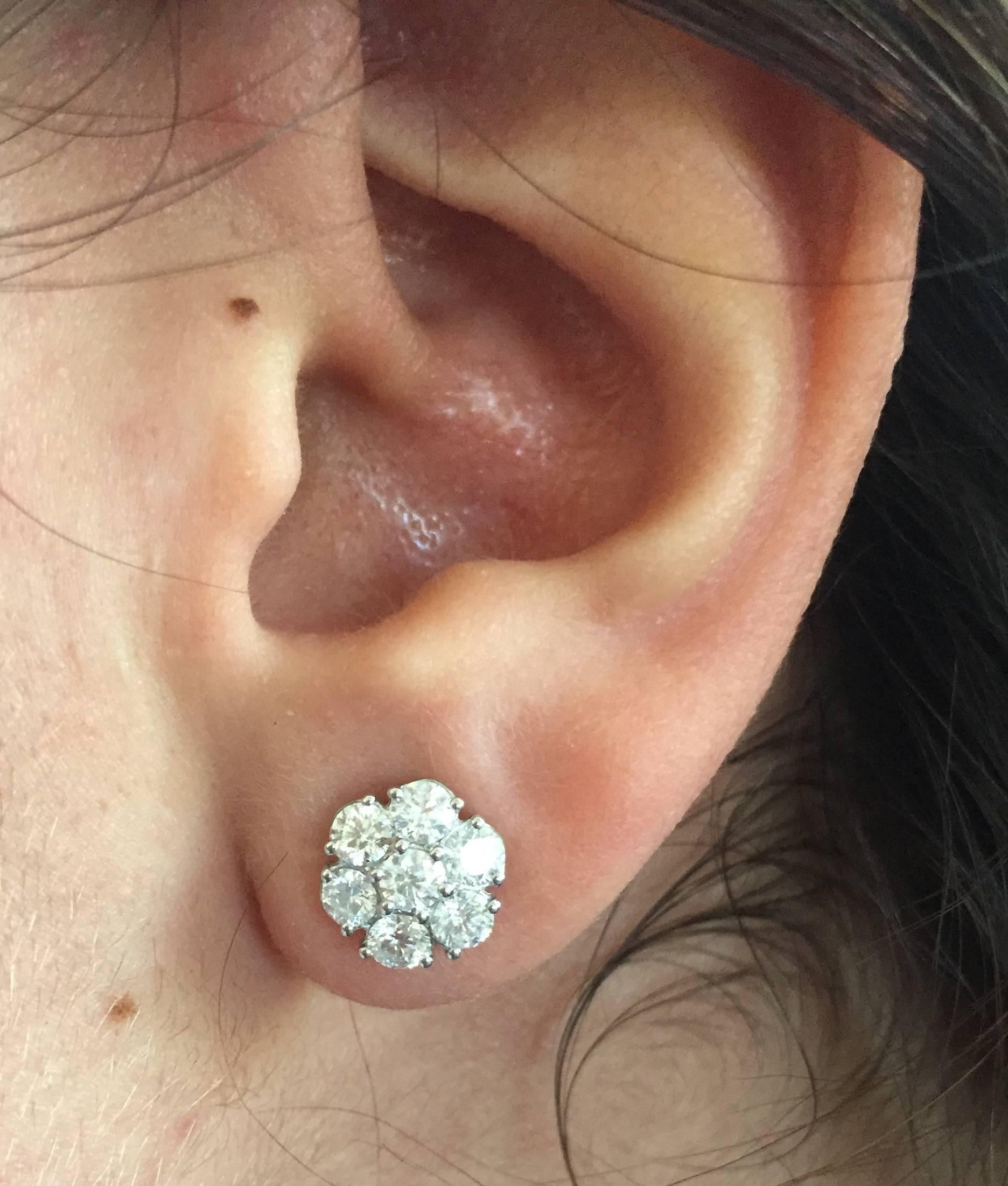 These gorgeous Cluster Earrings are a must have piece to add to your jewelry collection. Any look or occasion can be tied together with these timeless earrings. The carat weight is 3.21, the color is G, and the clarity is SI.