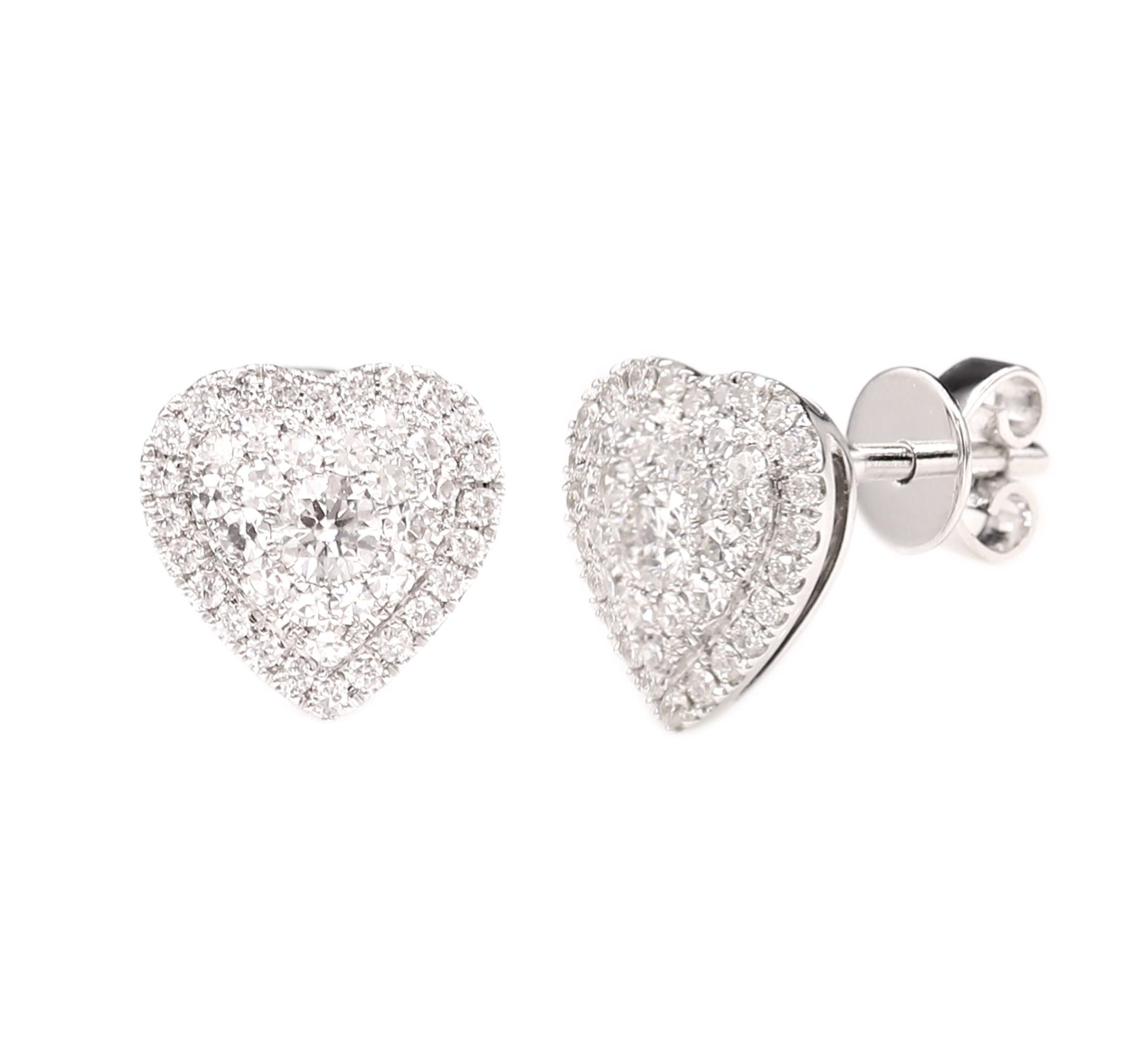 These Hearts are Super Cluster Hearts of Brilliant Diamonds, The special craftsmanship makes the diamonds visible to the eye as one large diamond, must see it to believe it ! Heart size approx 10 mm, 18k white gold 3.30 grams.
Total Diamonds 0.70