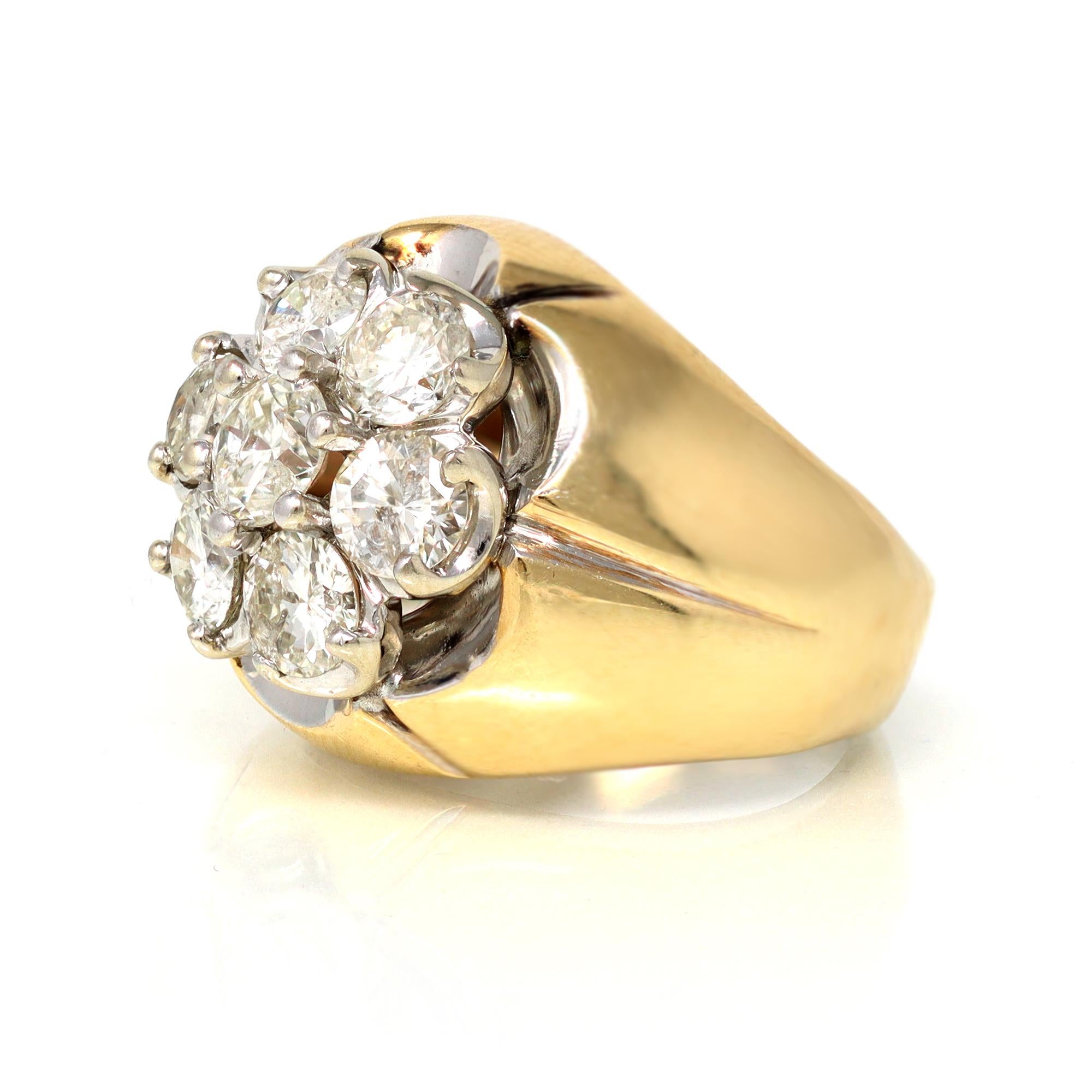 The impressive cluster diamond ring is circa 1950. It is styled in two-tone 14-karat yellow and white gold. It presents seven diamonds of approximately 0.35 carats each, with an estimated total carat weight of 2.40 carats. The diamonds have a grade