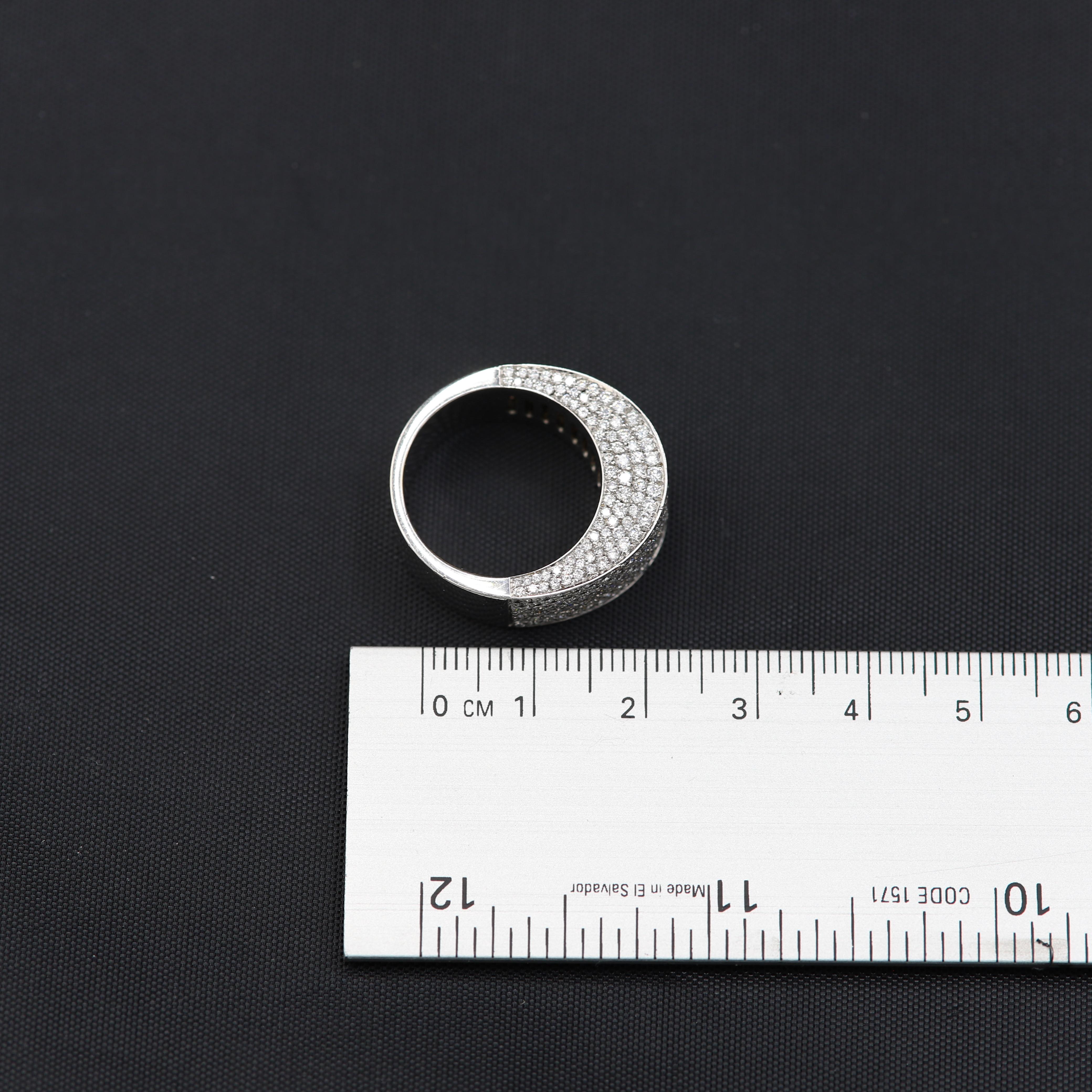 Cluster Dome Diamond ring
18k white gold 12.8 grams
Diamonds 2.49 carat G-VS
10 mm wide
finger size 7