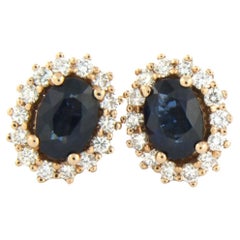 Cluster earring studs set with sapphire and brilliant cut diamonds 18k pink gold