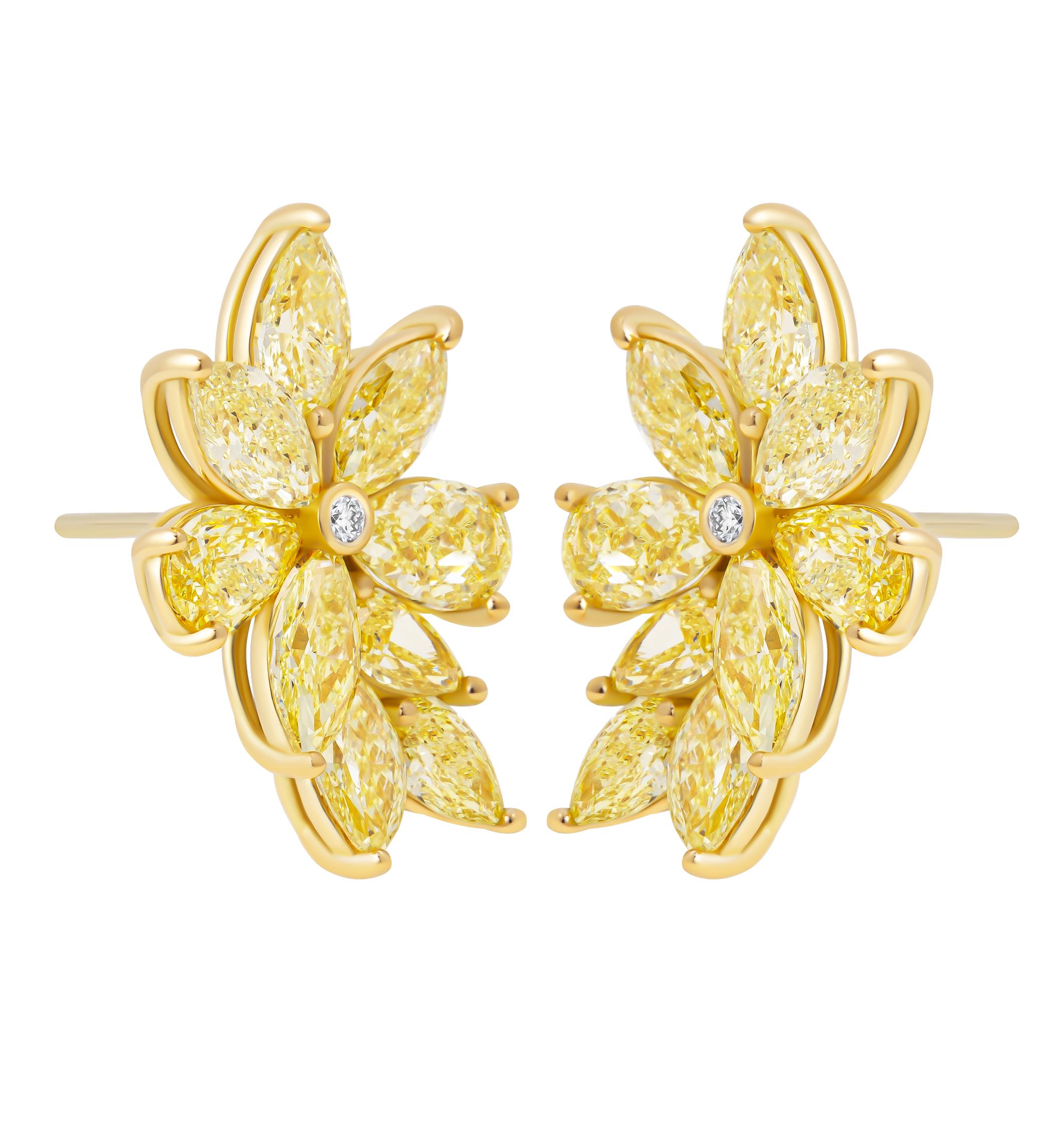 Orecchini a grappolo con diamanti gialli fantasia
Montato in oro giallo 18 carati
Diamanti Fancy Yellow Marquee per un totale di 2,79ct
Diamanti gialli a forma di pera per un totale di 3,61 carati
Diamanti bianchi rotondi per un totale di 0,03