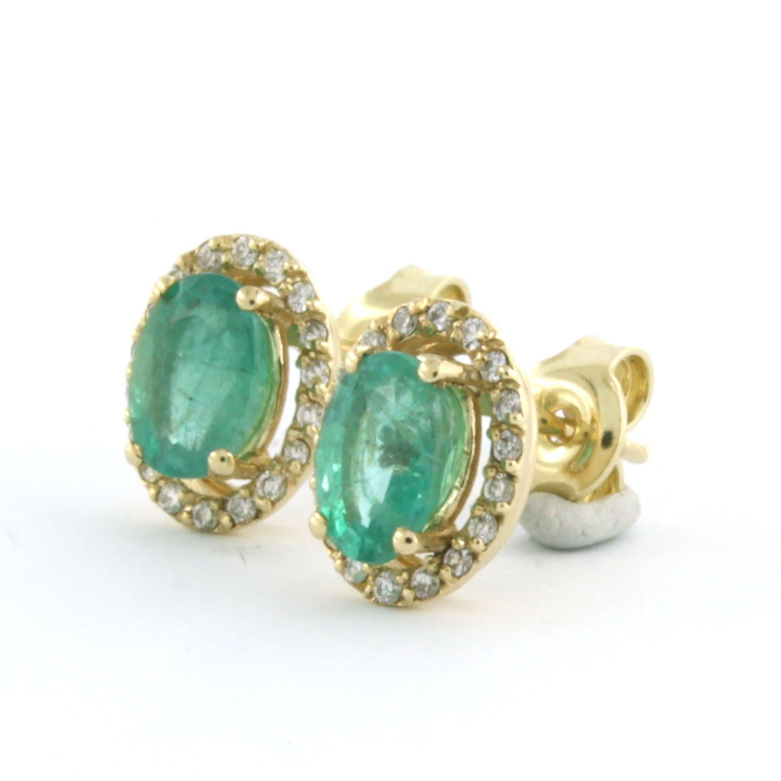 Women's Cluster Earrings set with Emerald and diamonds 14k yellow gold For Sale