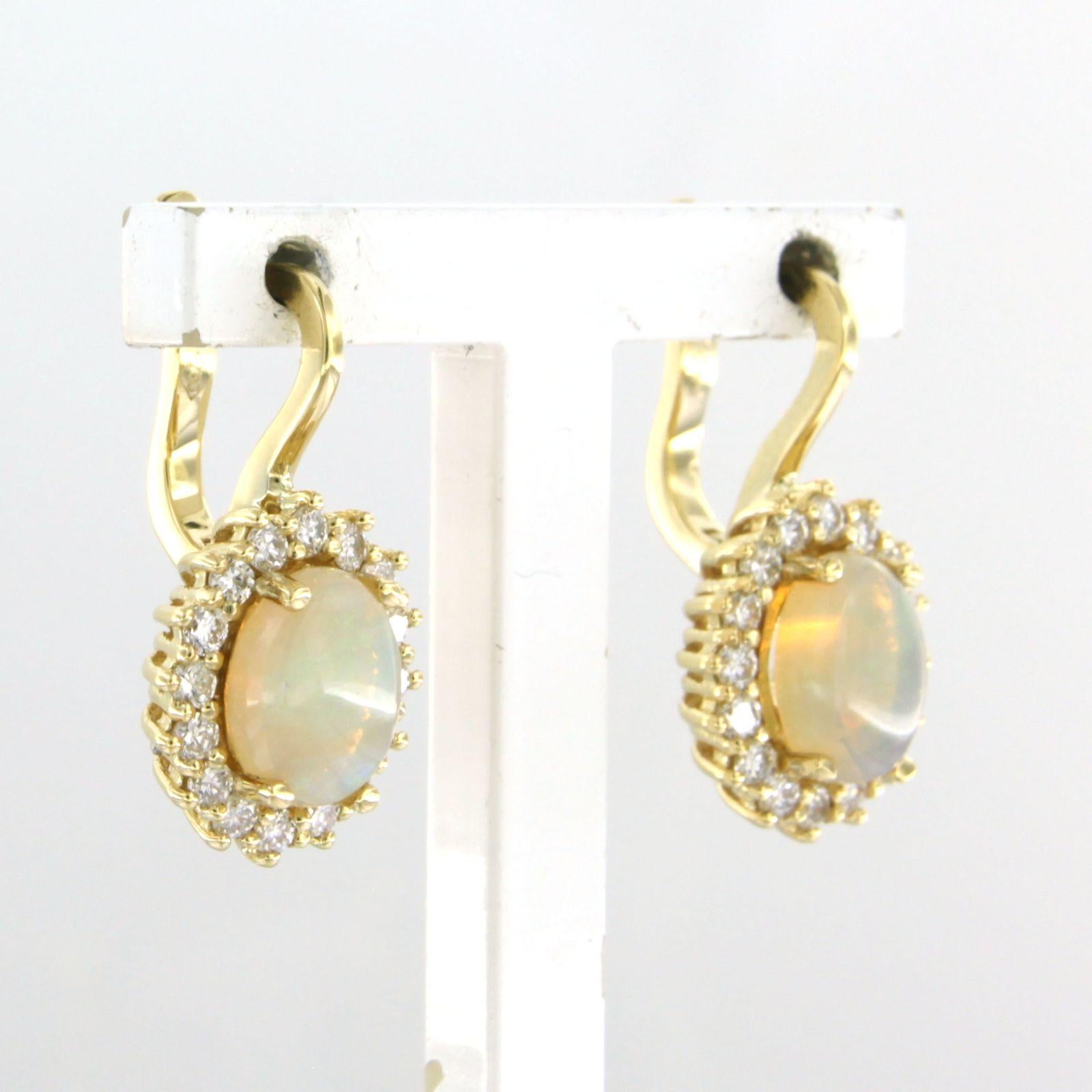 Modern Cluster earrings set with opal and diamonds 18k yellow gold