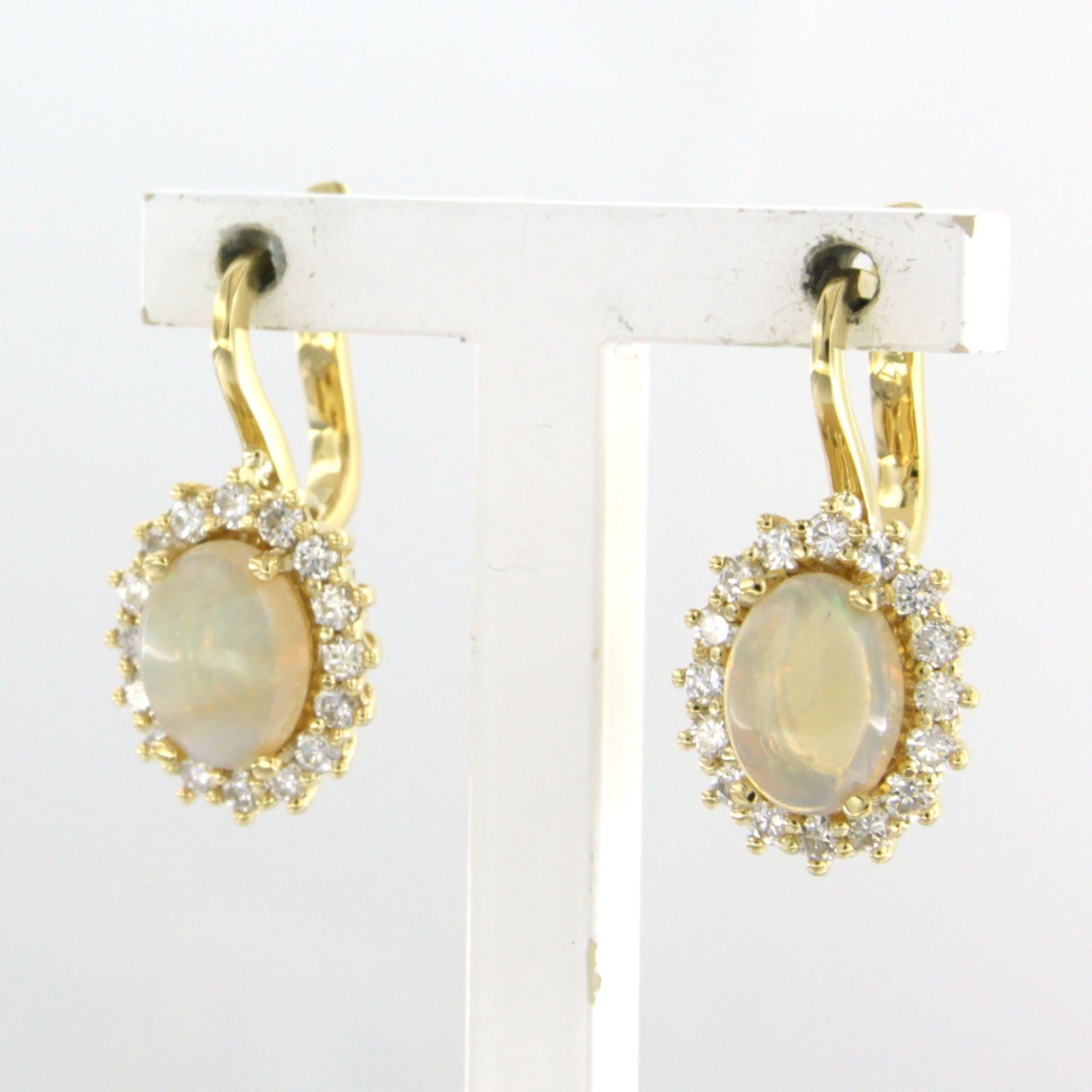 Brilliant Cut Cluster earrings set with opal and diamonds 18k yellow gold
