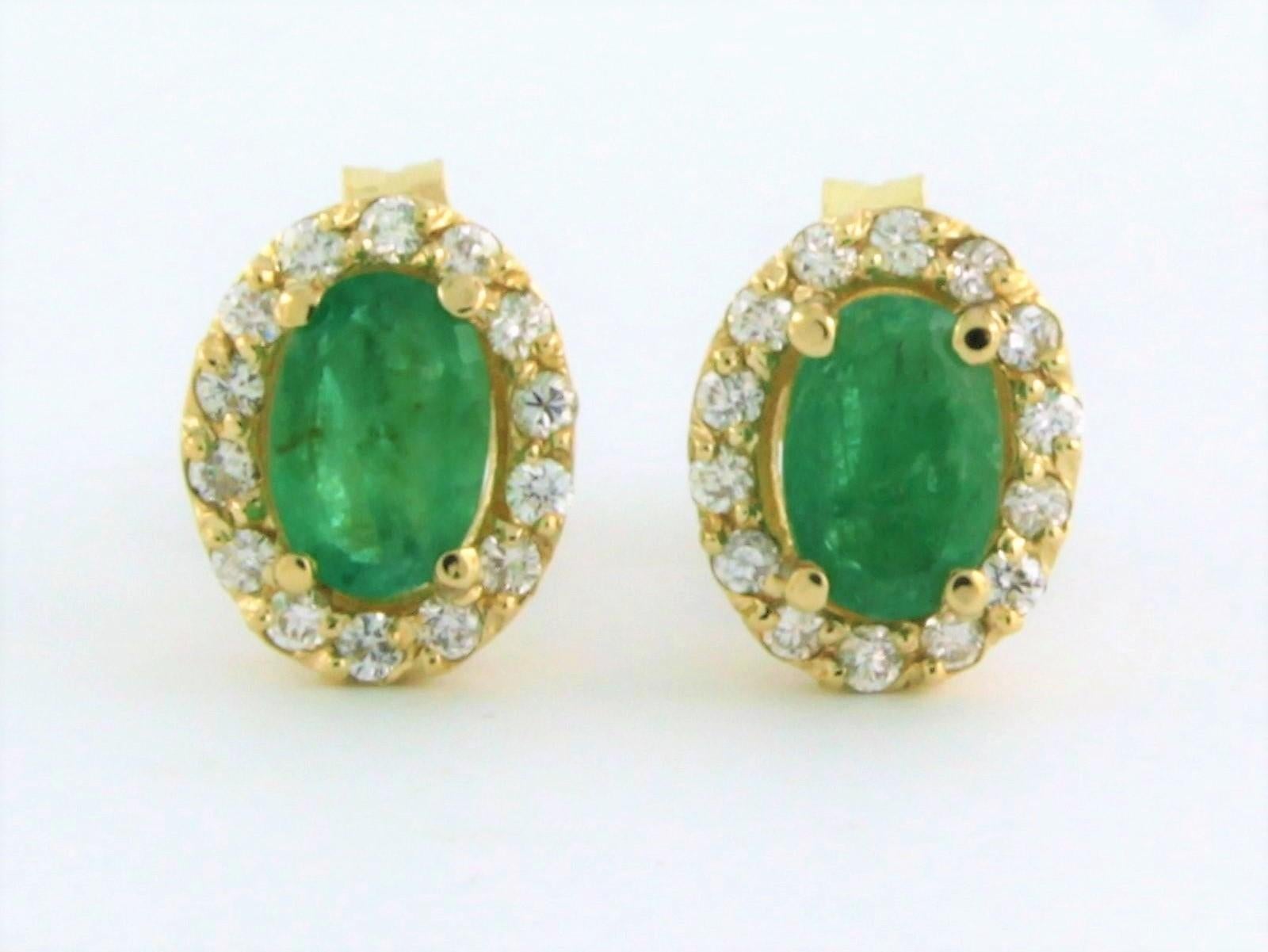 14k yellow gold entourage earrings set with emerald and brilliant cut diamonds. 0.22ct - F/G - VS/SI

detailed description

the size of the ear stud is 9.1 mm long by 7.4 mm wide

weight 2.2 grams

set with

- 2 x 6.0 mm x 4.0 mm oval cabochon cut