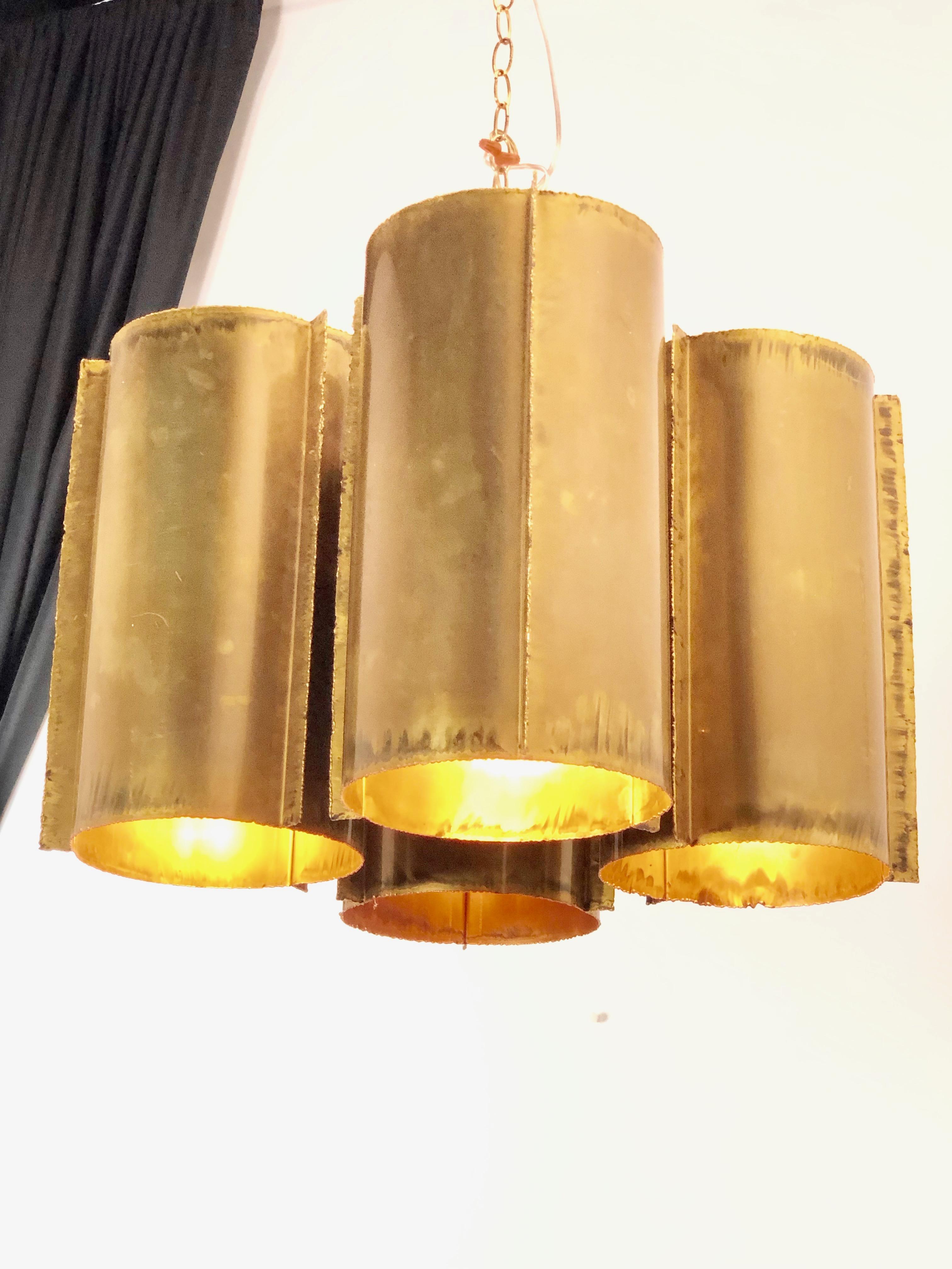 Cluster of four cylinder Brutalist tube chandelier. Fixture is in good vintage condition with some wear due to age and use.
Original wiring, circa 1970s.

Two Available 

Dimensions: 
20