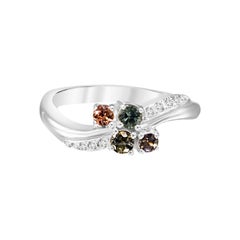 Bague en or blanc 18 carats avec grappe de saphirs du Montana et diamants